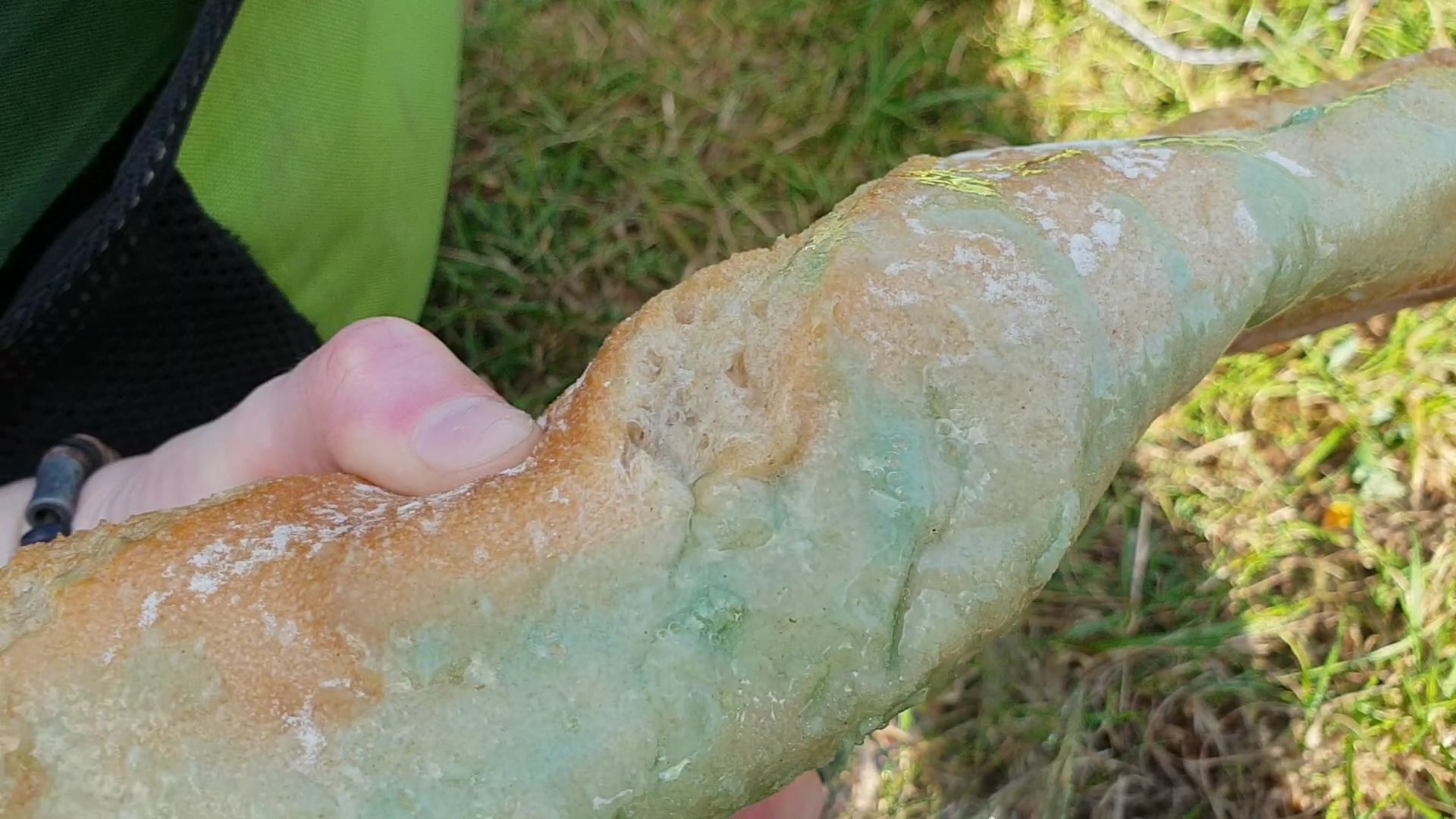 A baguette covered in spilled washing up liquid.