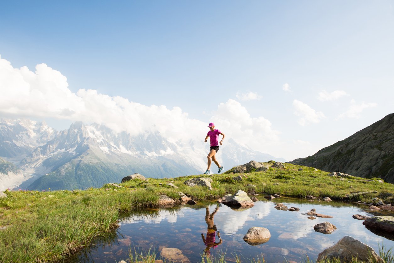 A woman running in the mountains