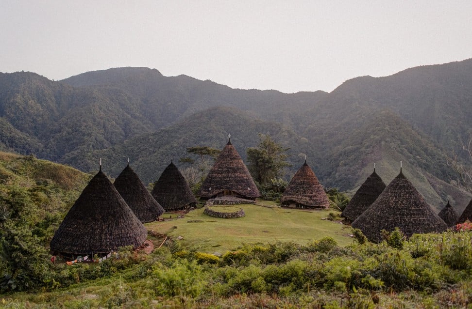 The conical huts of Wae Rebo in Indonesia, which are built to an ancient Manggarai design