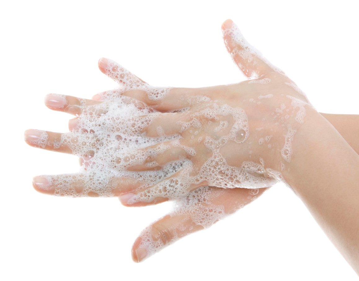 Hands covered in lather from soap.