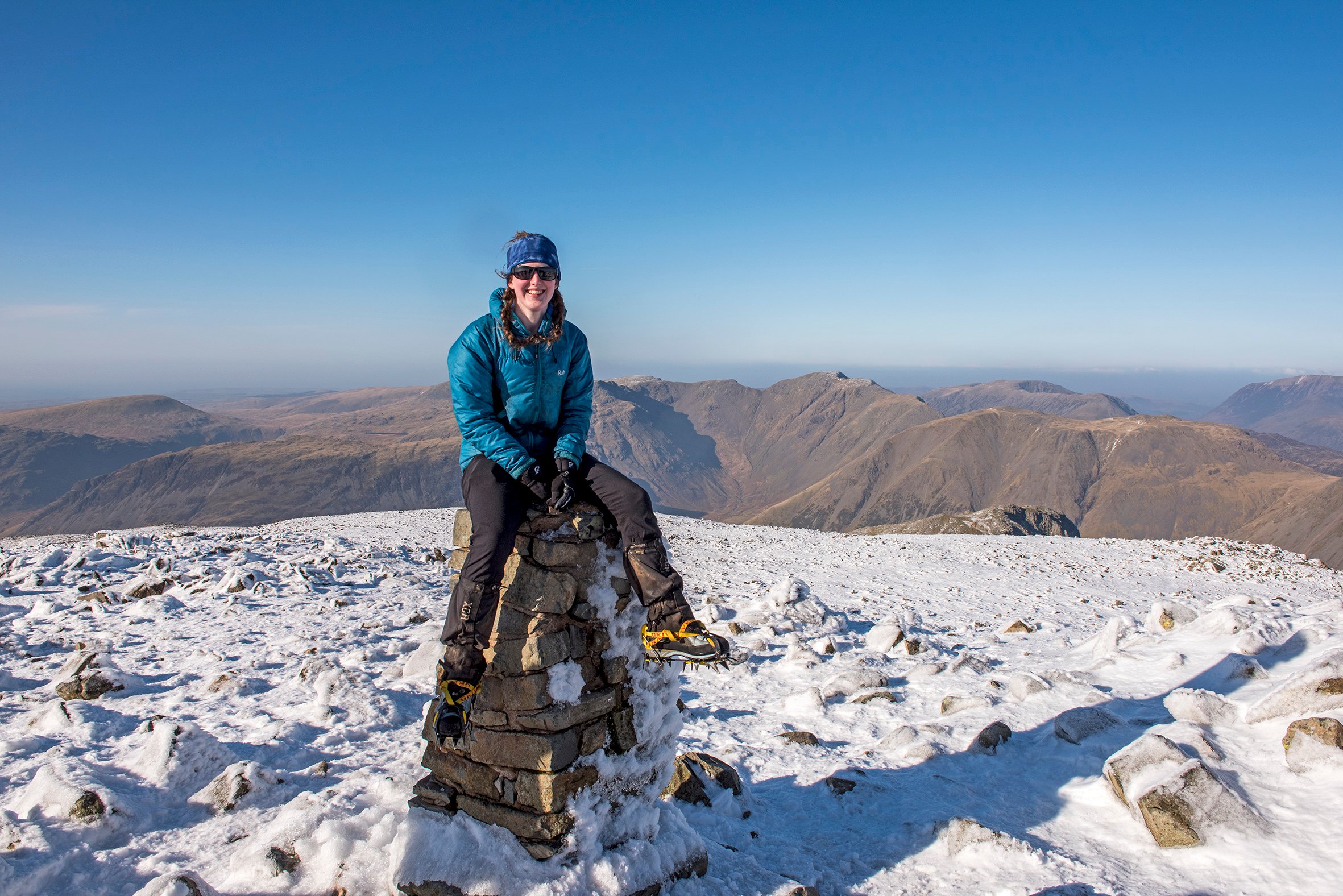 Emily Woodhouse on the snowy summit of Scafell Pike