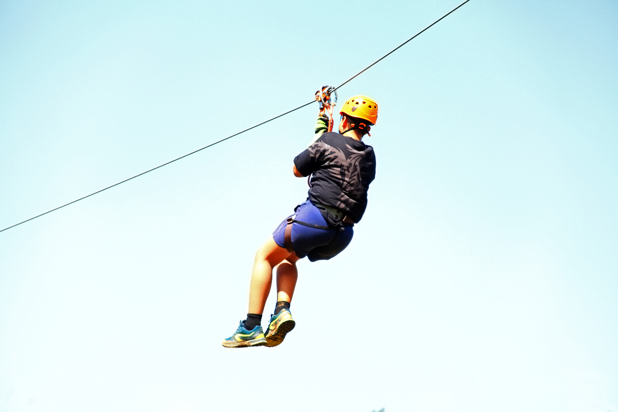 Zip lining is a quick hit of adventure and adrenaline! | iStock: narcisa
