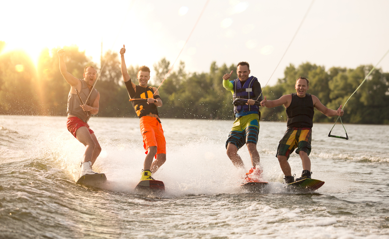 Wake boarders on a lake | iStock: Eugene_Onischenko