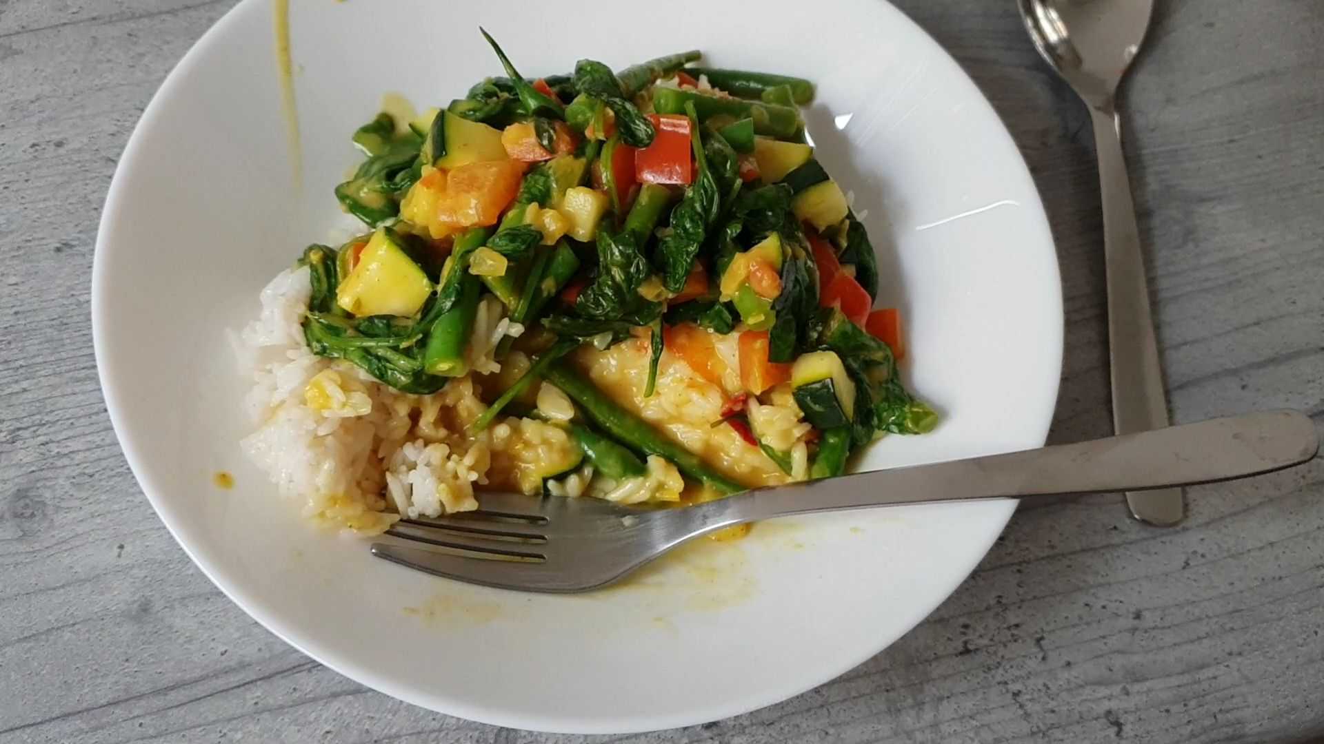 Vegetables and rice cooked on a camping stove.