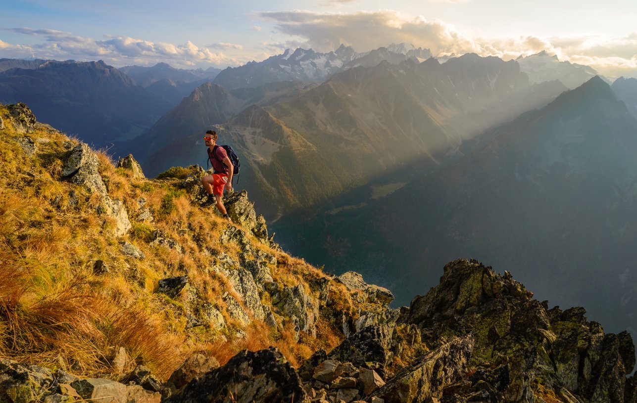 A male hiker in the mountains