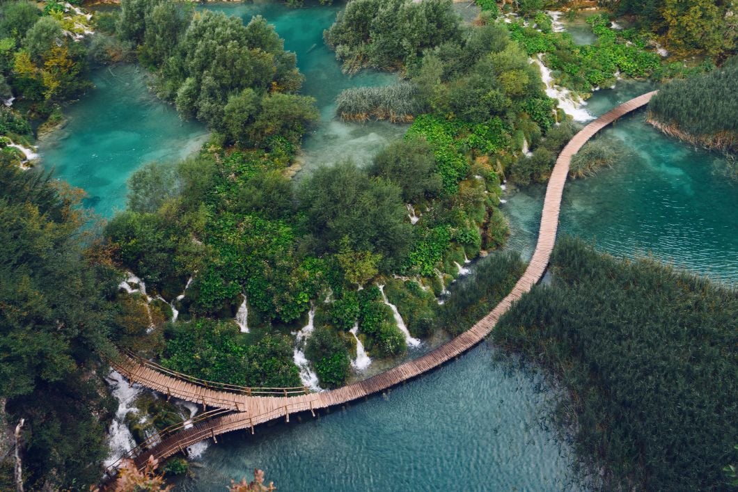 A photograph of Plitvice, taken either by a drone or a woodpecker with opposable thumbs.