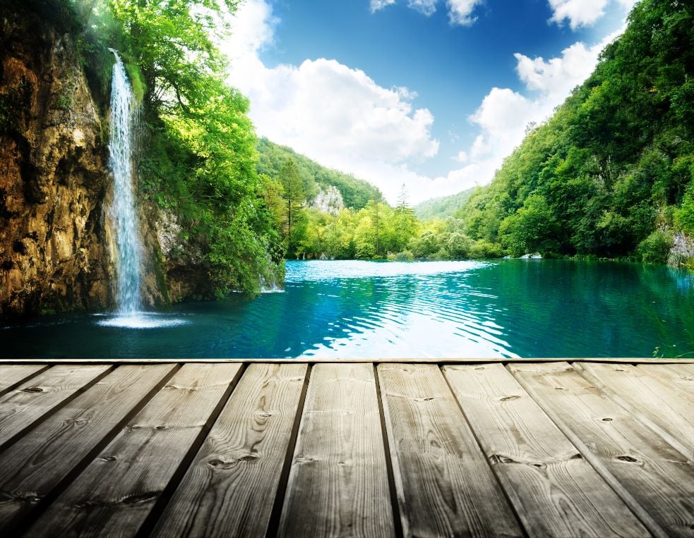 A quiet waterfall and boardwalk in Plitvice Lakes National Park in Croatia.