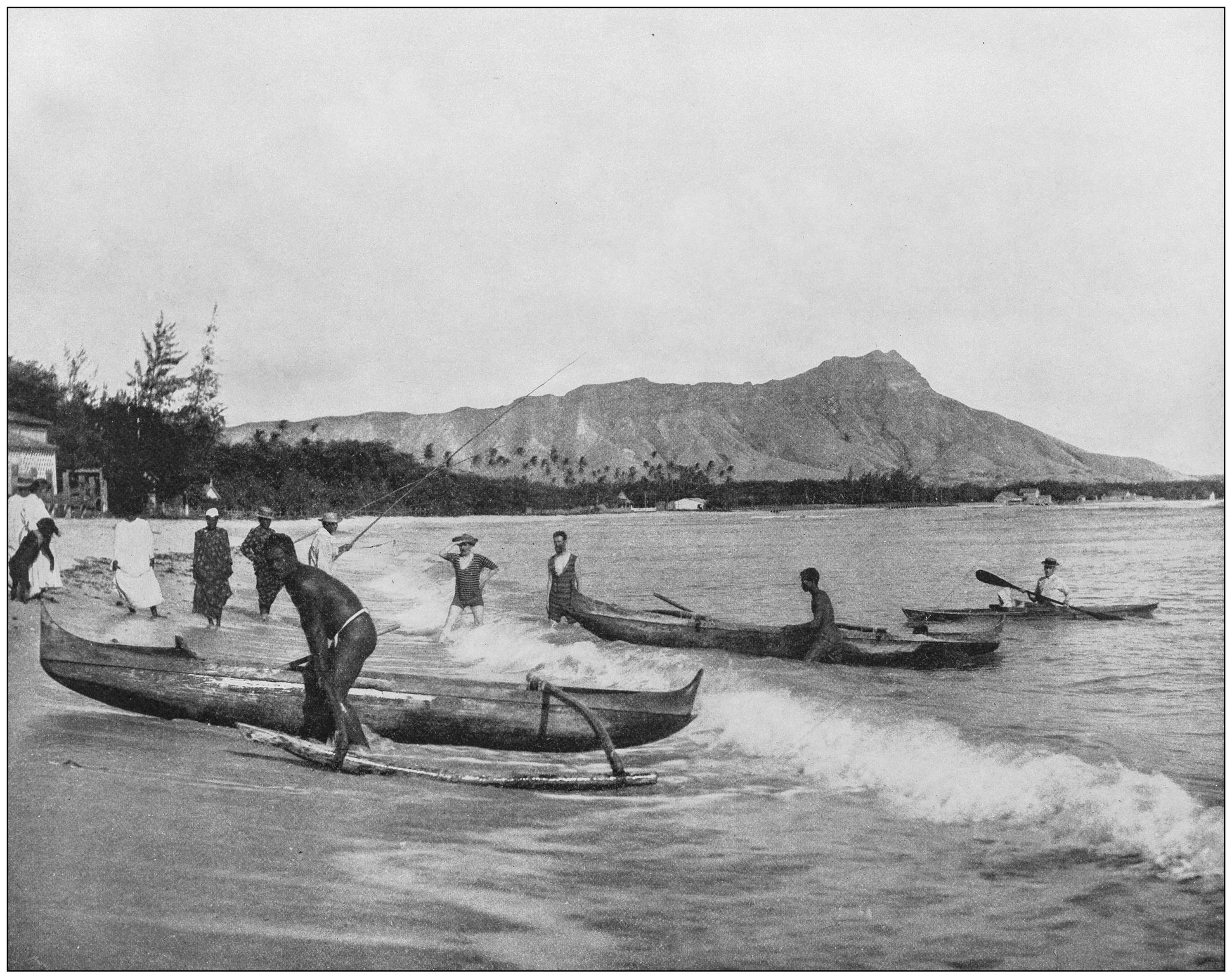 A historical photo of canoes in Hawaii