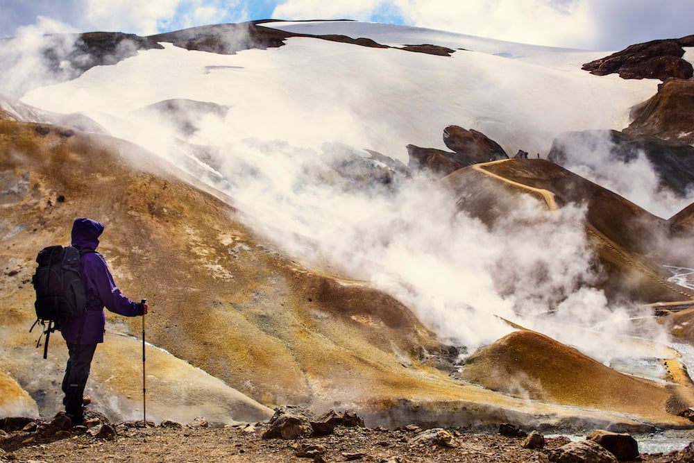 A hiker in Iceland, overlooking the highlands near Kerlingarfjöl