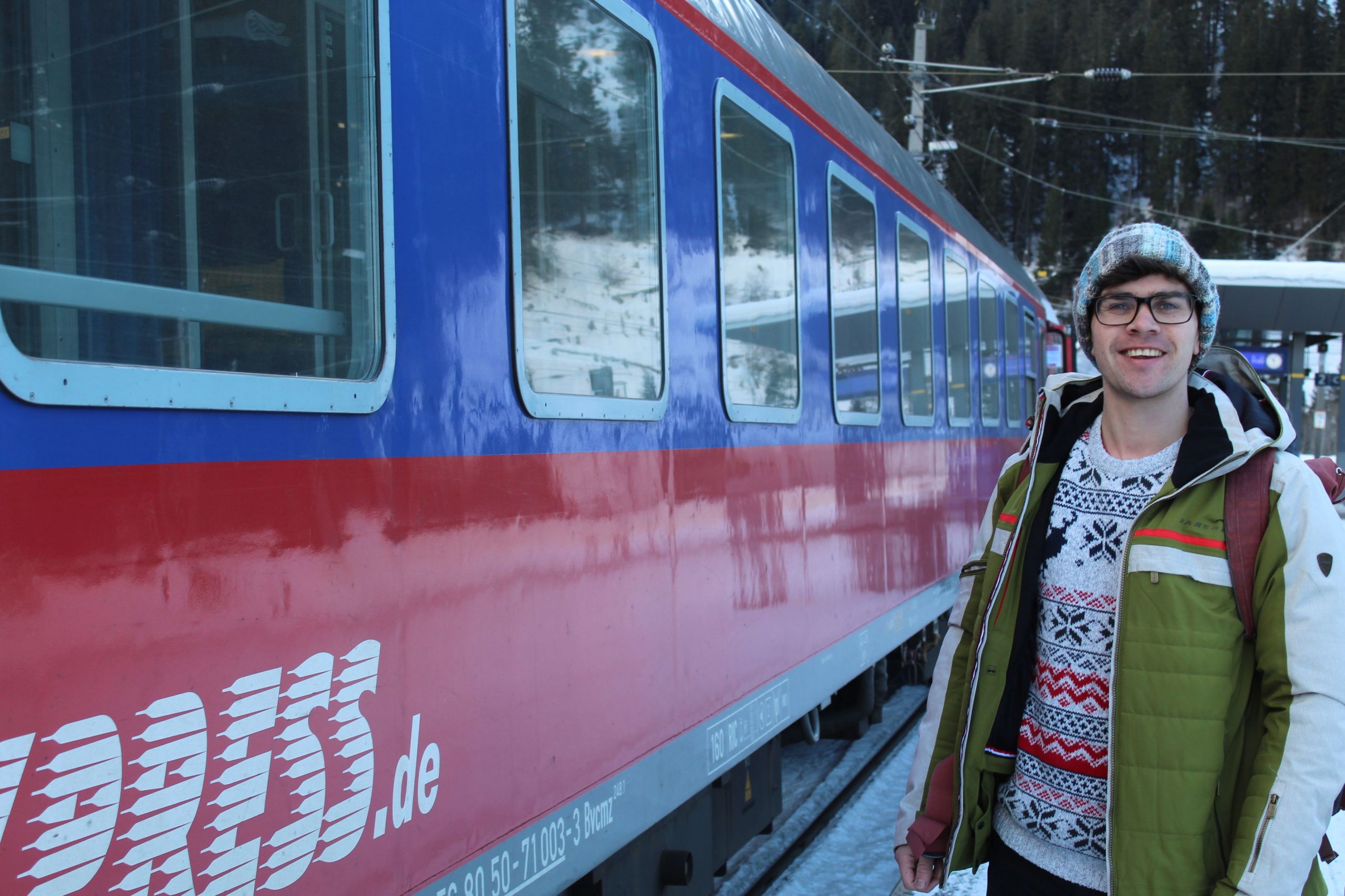 Writer Stuart Kenny poses next to the Alpen Express.