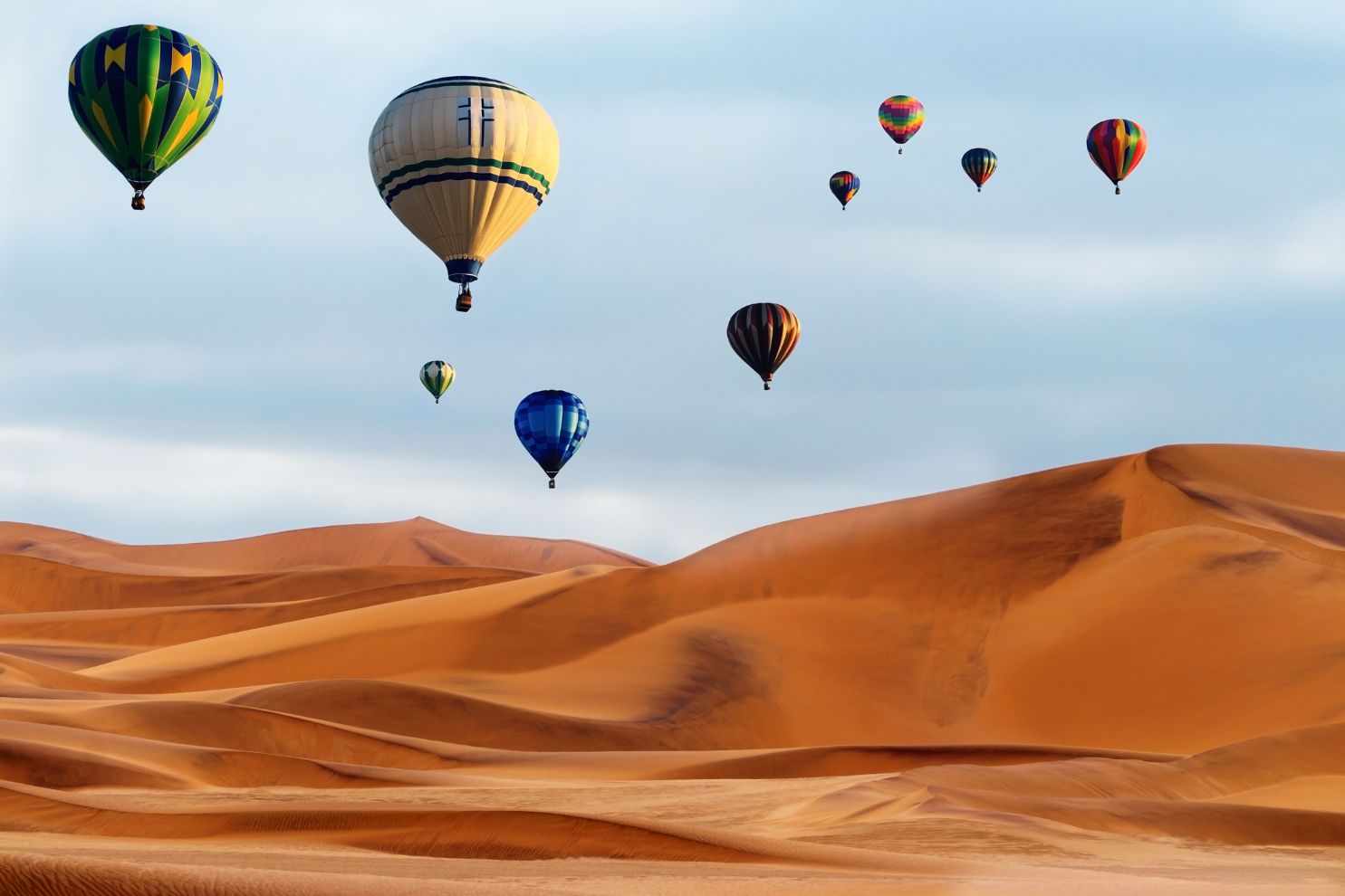 Hot air balloons in the Namib Desert.