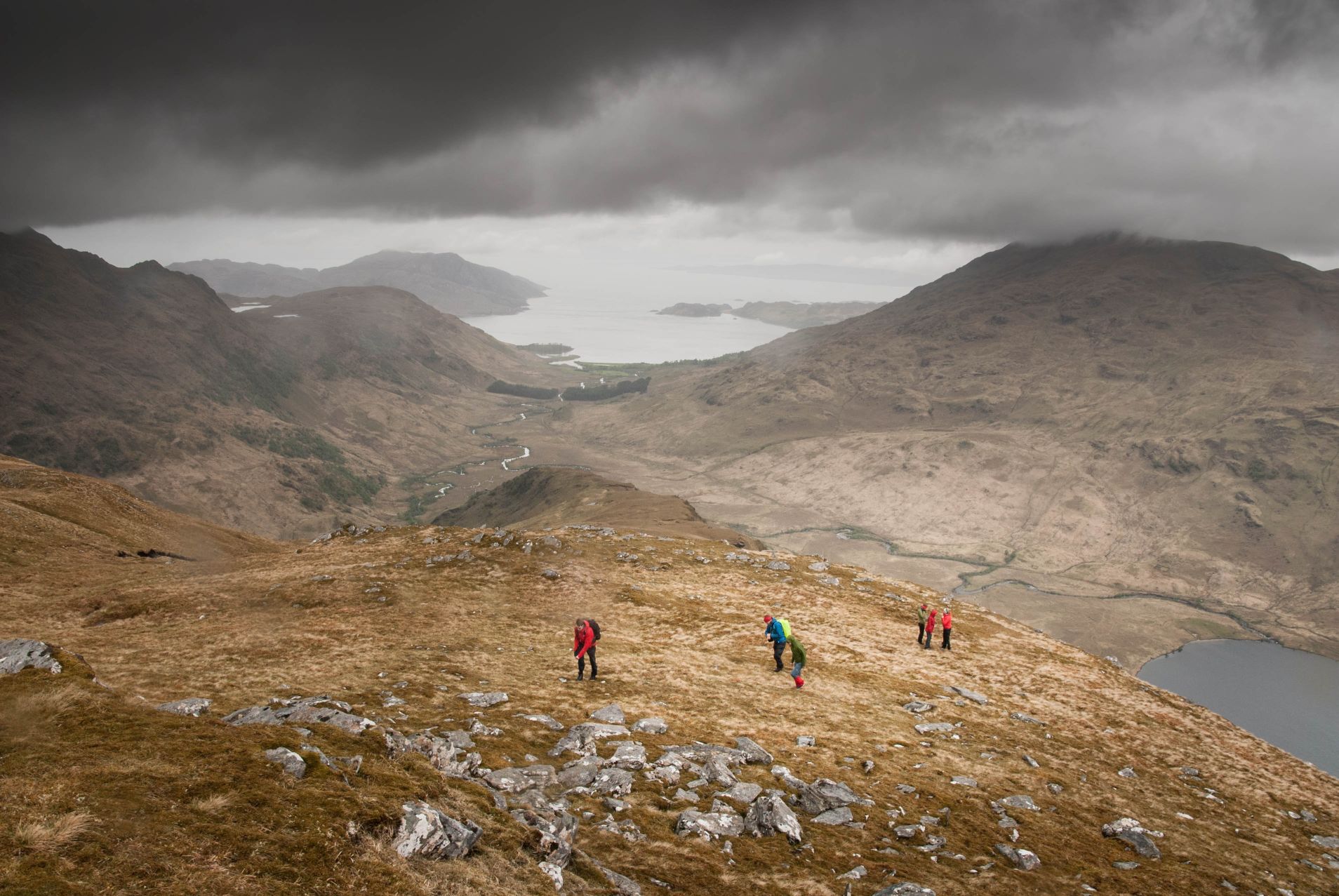Hikers on Mount Inverie, Scotland.