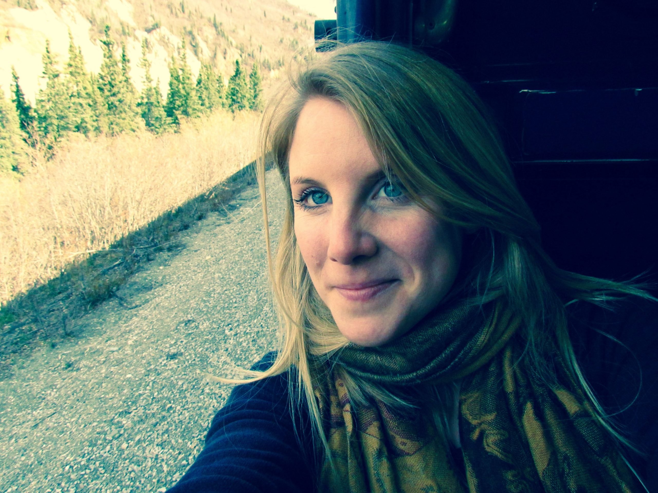 Emily Thomas, author of the Meaning of Travel, takes a train selfie.