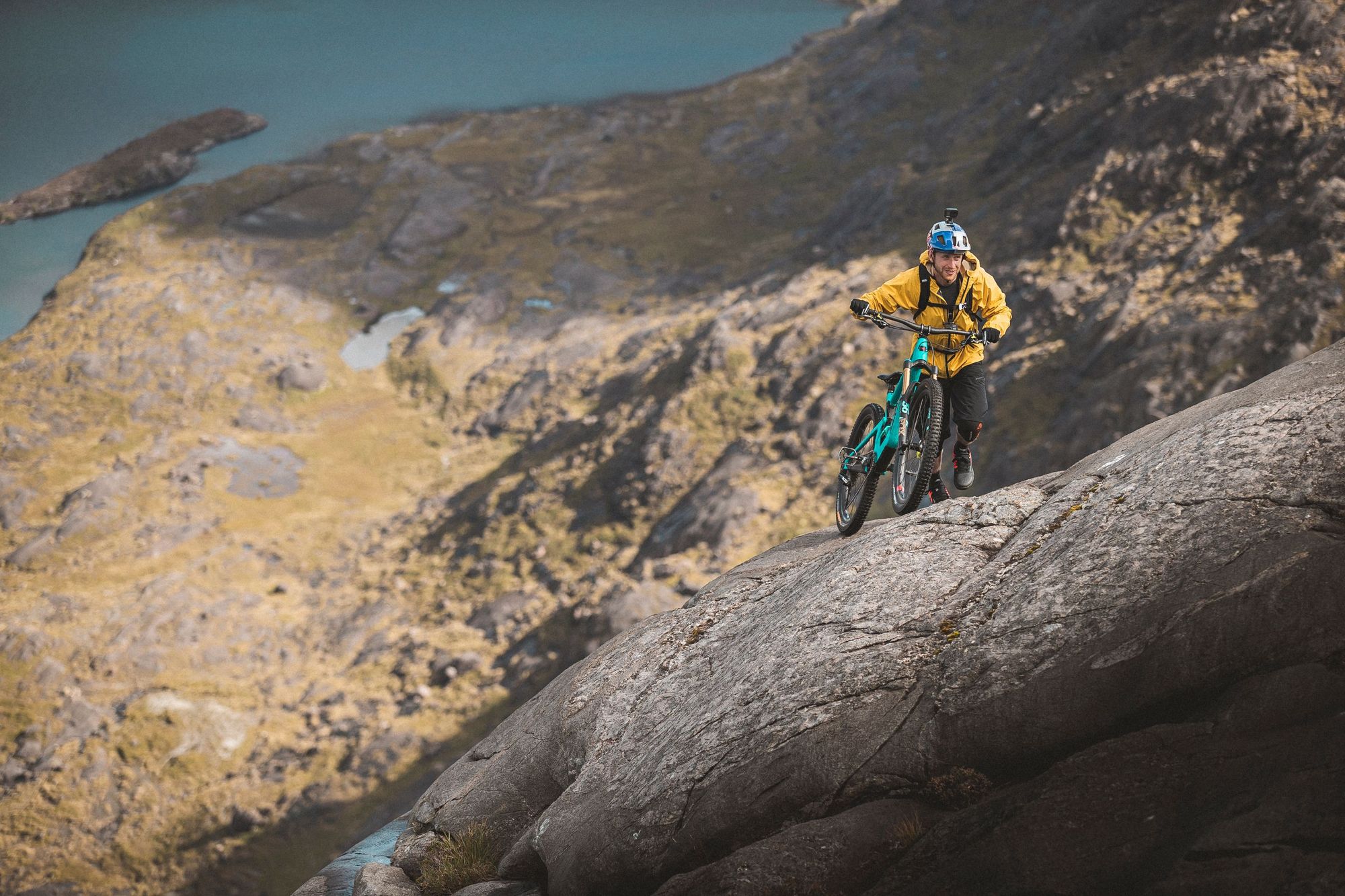 Cyclist Danny MacAskill making the steep ascent of Sgurr Dubh Beag