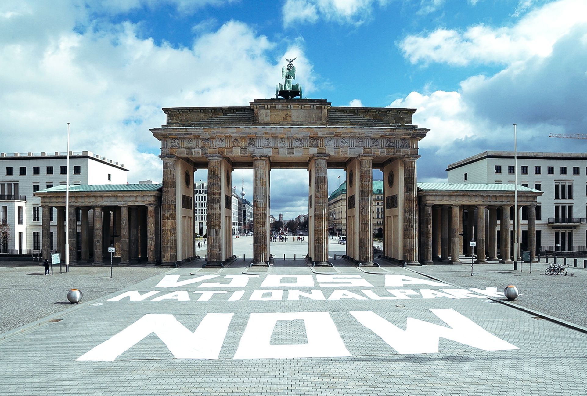 Graffiti protesting the damming of the Vjosa River, in front of Brandenburg Gate.