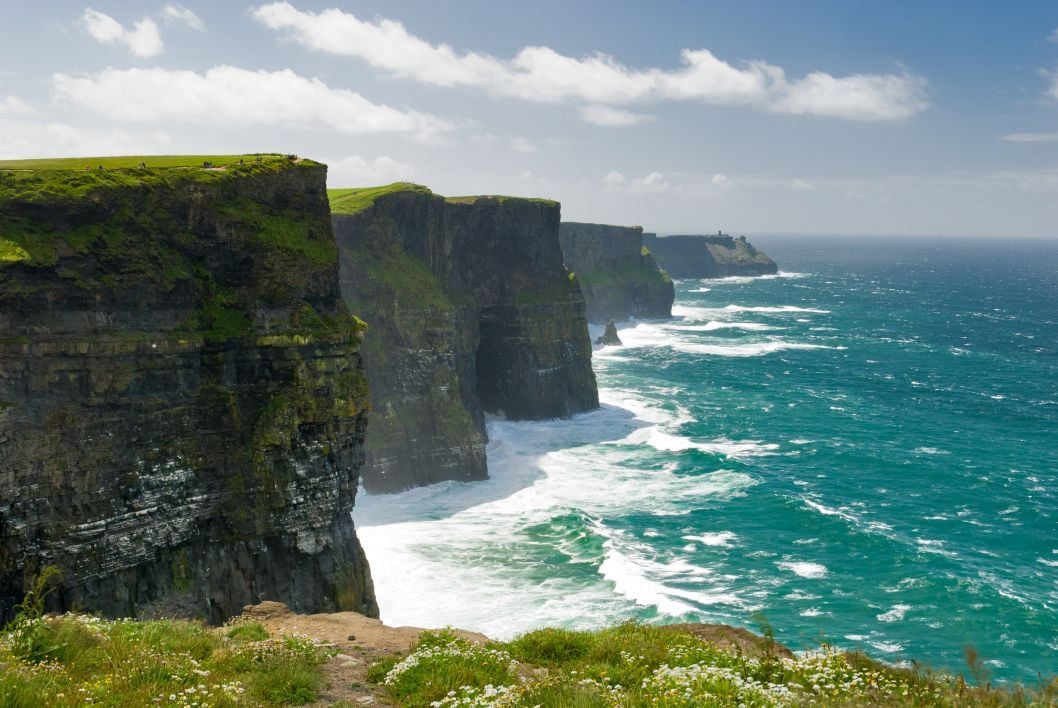 The Cliffs of Moher in County Clare, on a sunny day.