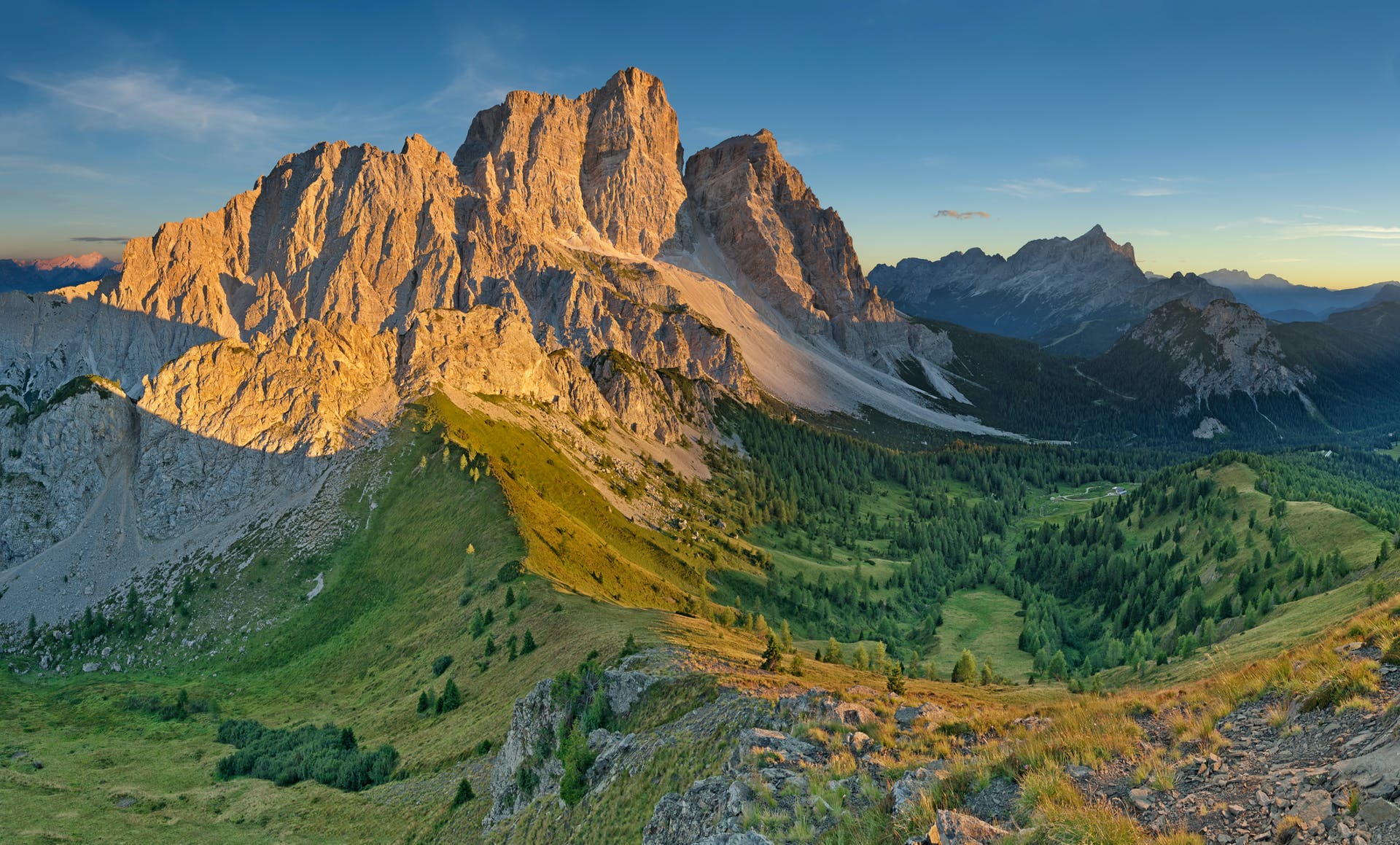 Early morning sunshine on the peaks of the Dolomites.