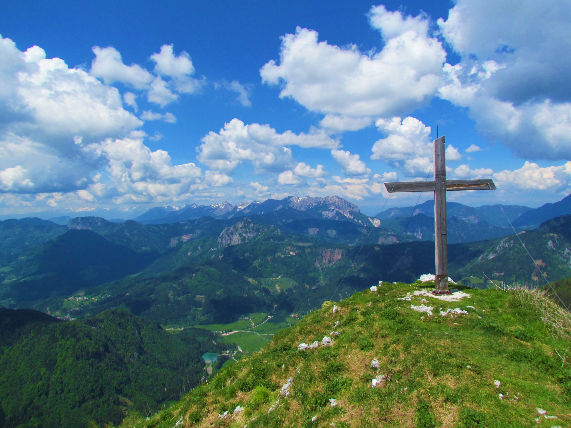 The wooden cross atop Goli Vrh, with views of the Karavanke Alps. Photo: Getty
