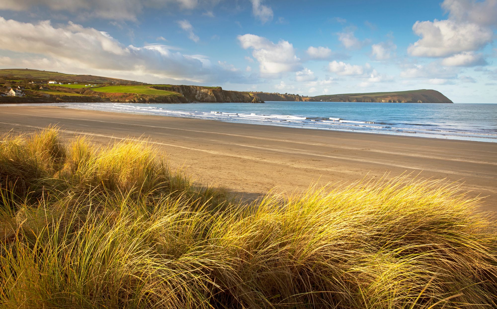 Newport Sands on the Pembrokeshire Coast Path, at low tide.