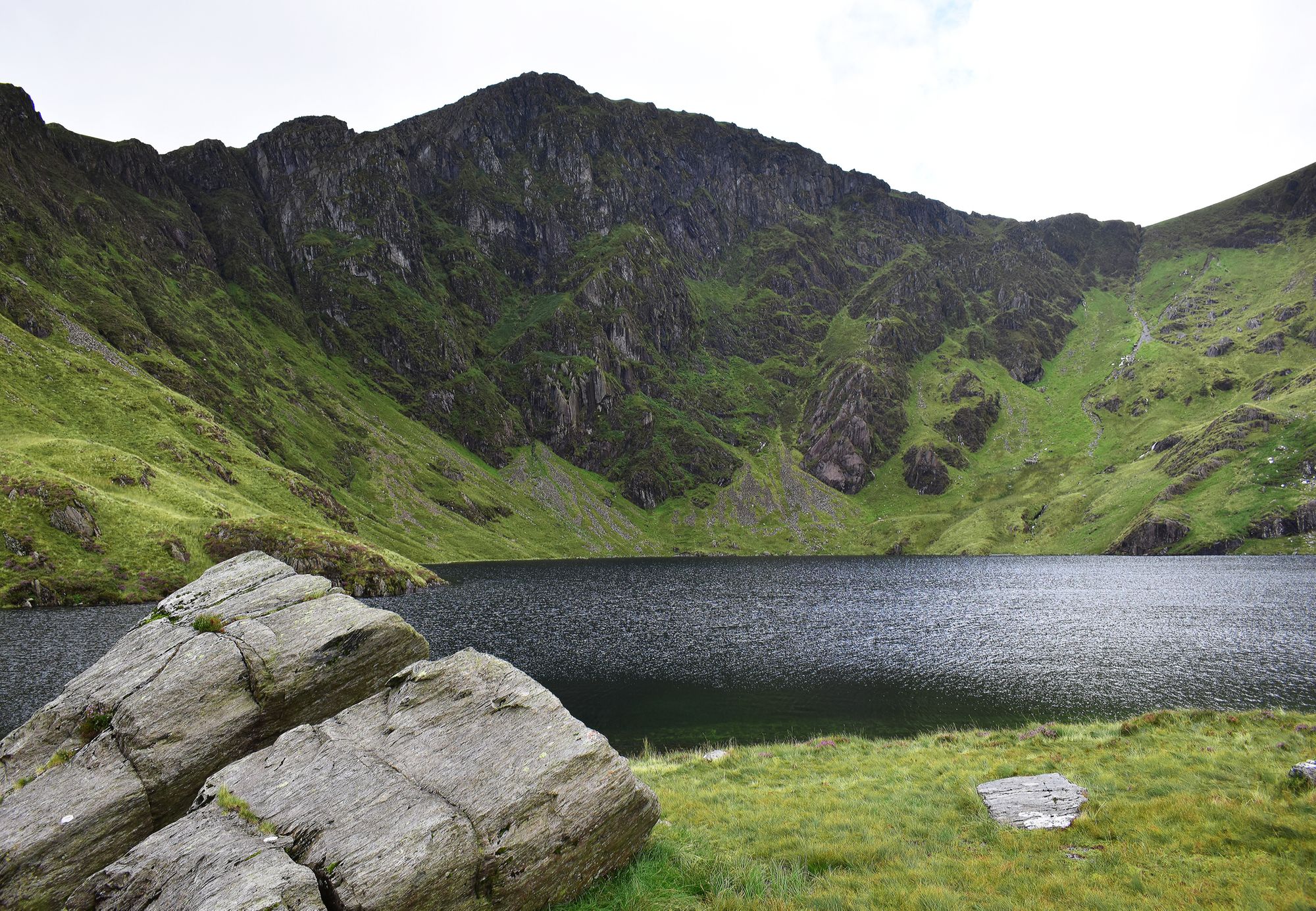 View of Cadair Idris from Llyn Cau on a cloudy day