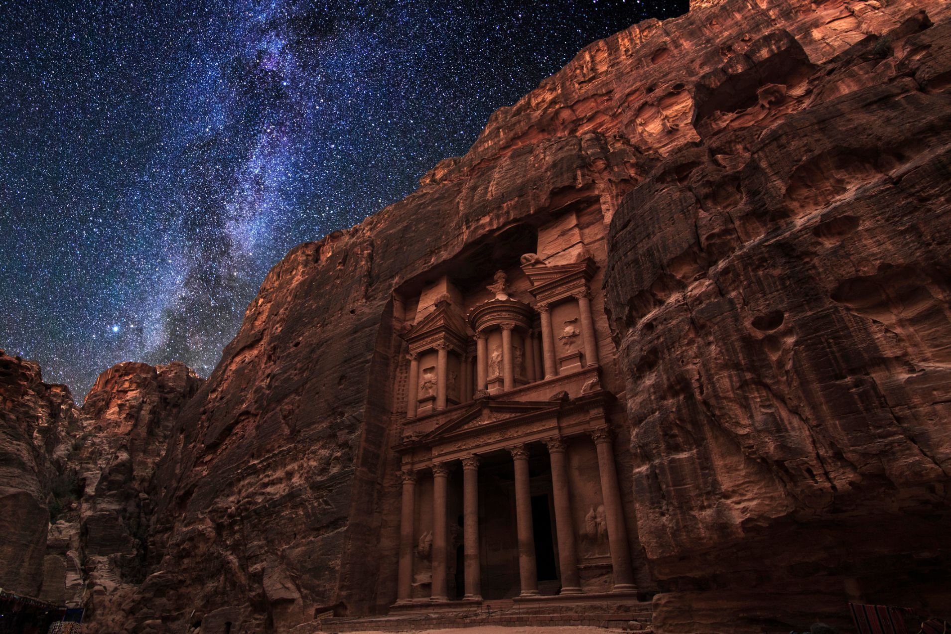 The stars above the facade of Al-Khazneh in Petra, which changes colour with the sun.