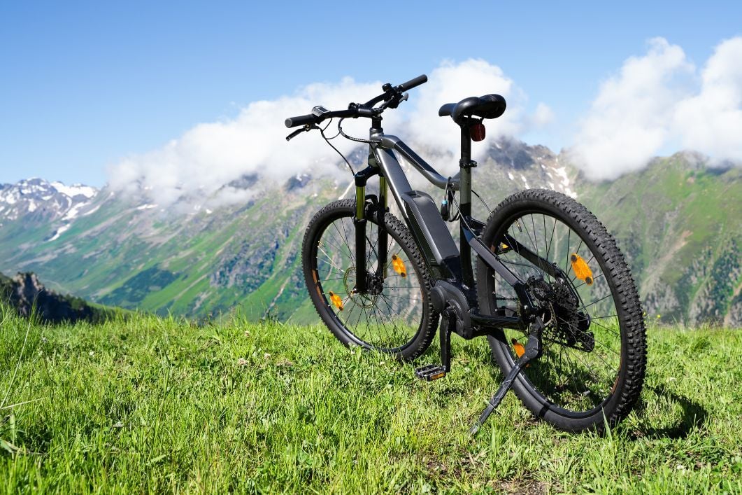 Say what you want about e-bikes, but they're certainly a quicker and more accessible way to explore the outdoors than pure pedal power. Photo: Getty
