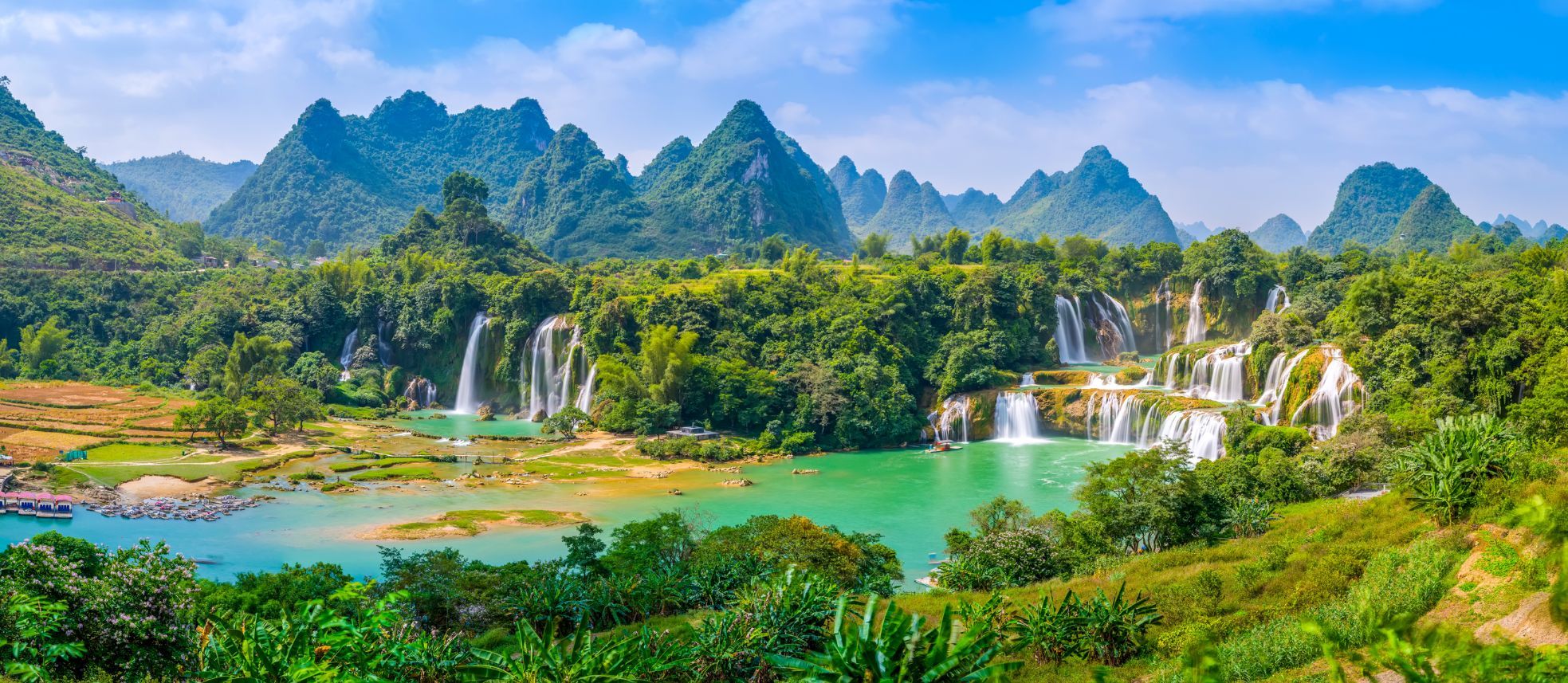 The Guangxi Chinese Detian cross-border waterfalls, surrounded by dense jungle. Photo: Getty
