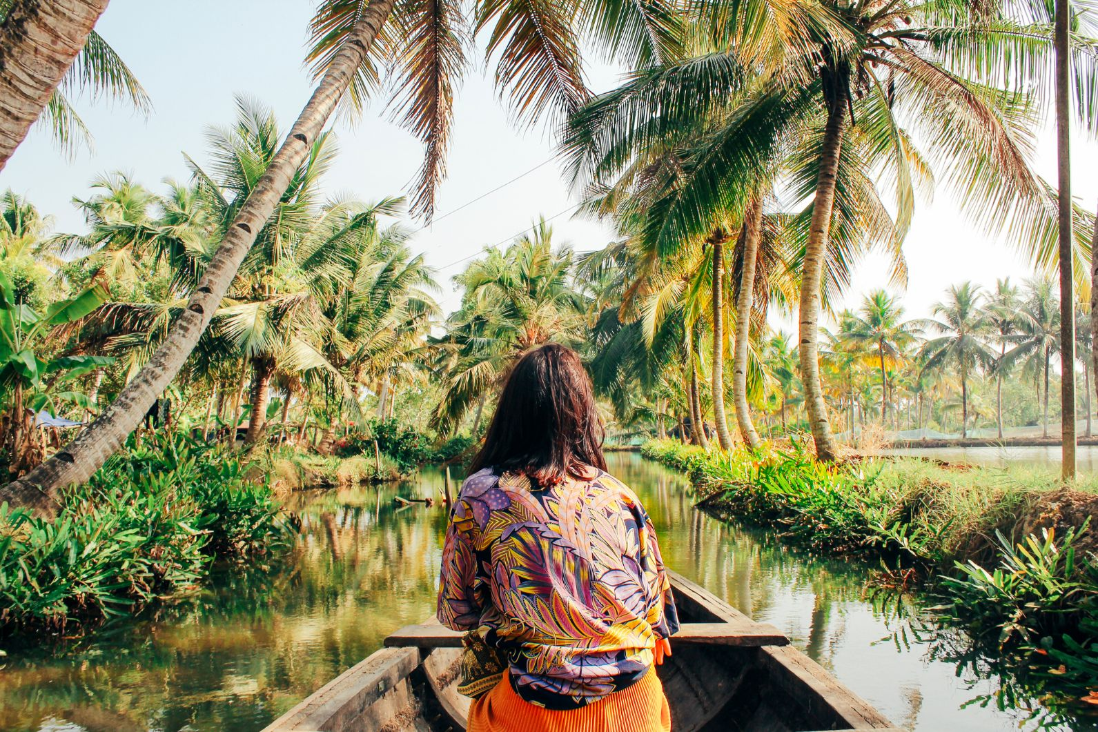 A woman kayaking in India's backwaters.