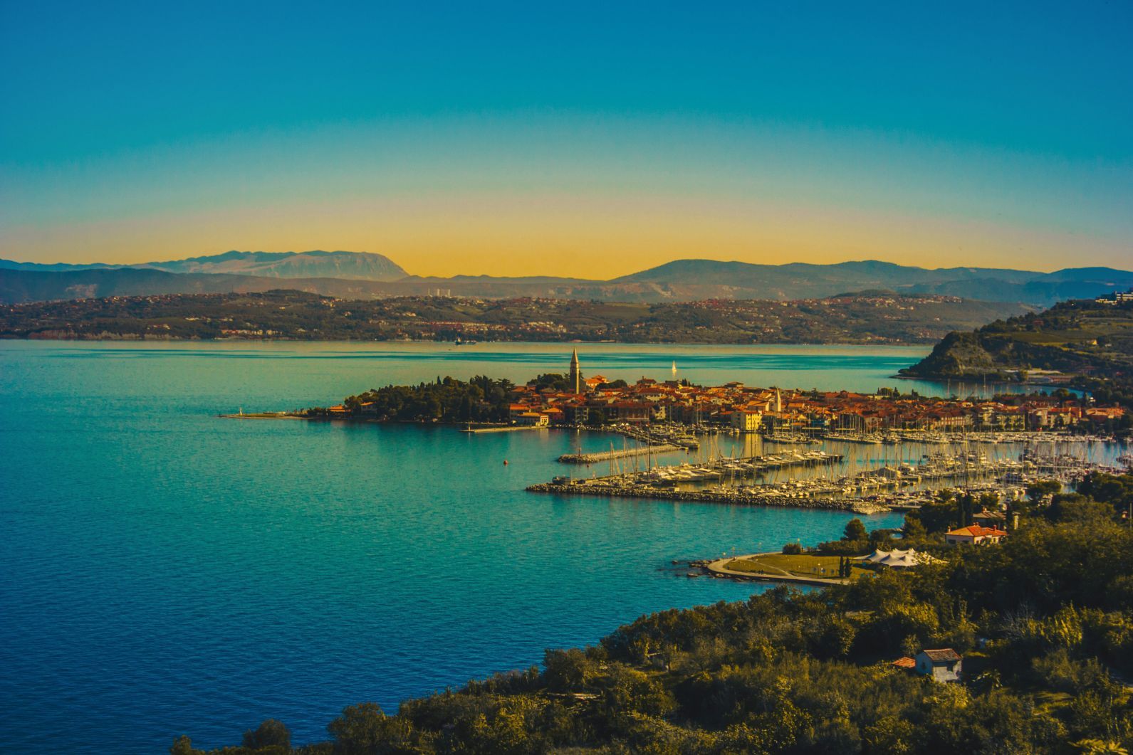 A stunning view over Izola city and the Adriatic Sea, from Slovenia over to Italy