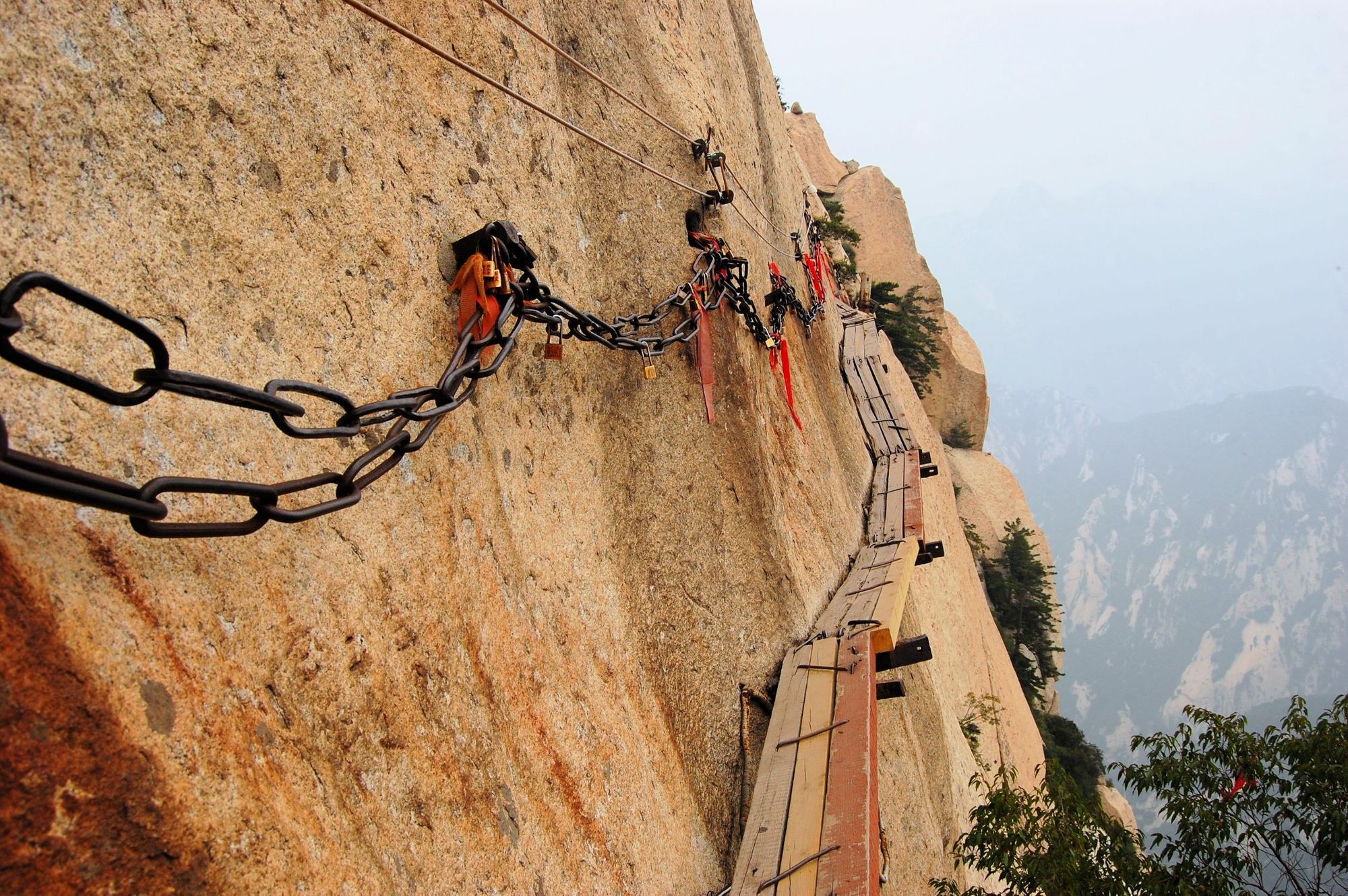 The perilous plank walk on  Hua Shan mountain in China.
