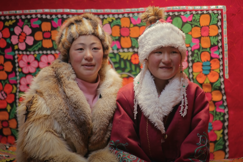 Igerim and Igerkh are learning the ancient tradition of eagle hunting from their father Esker. Photo: Beautiful Destinations / Film