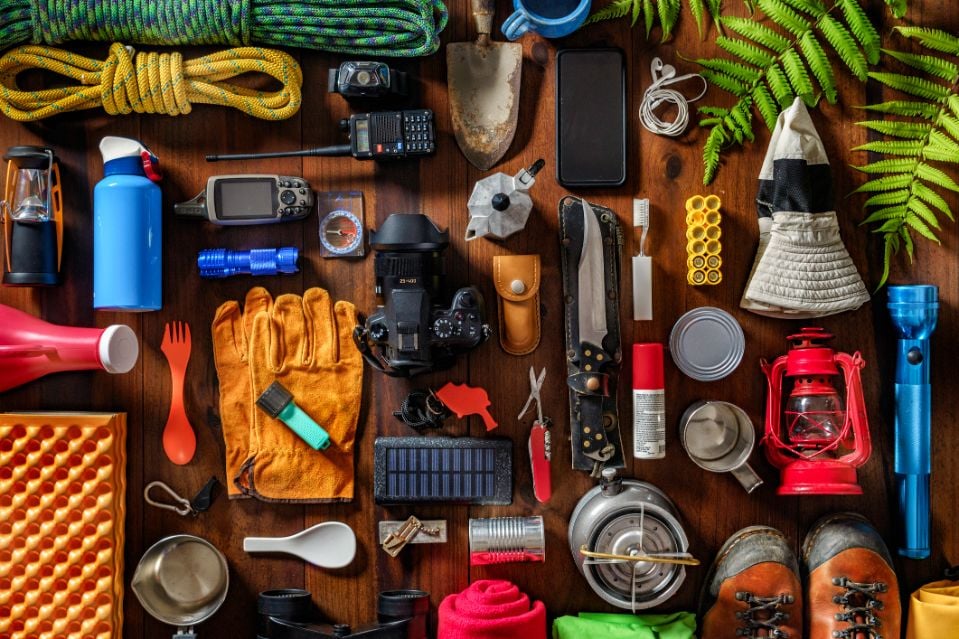 A lay flat of some hiking gear you might consider packing.