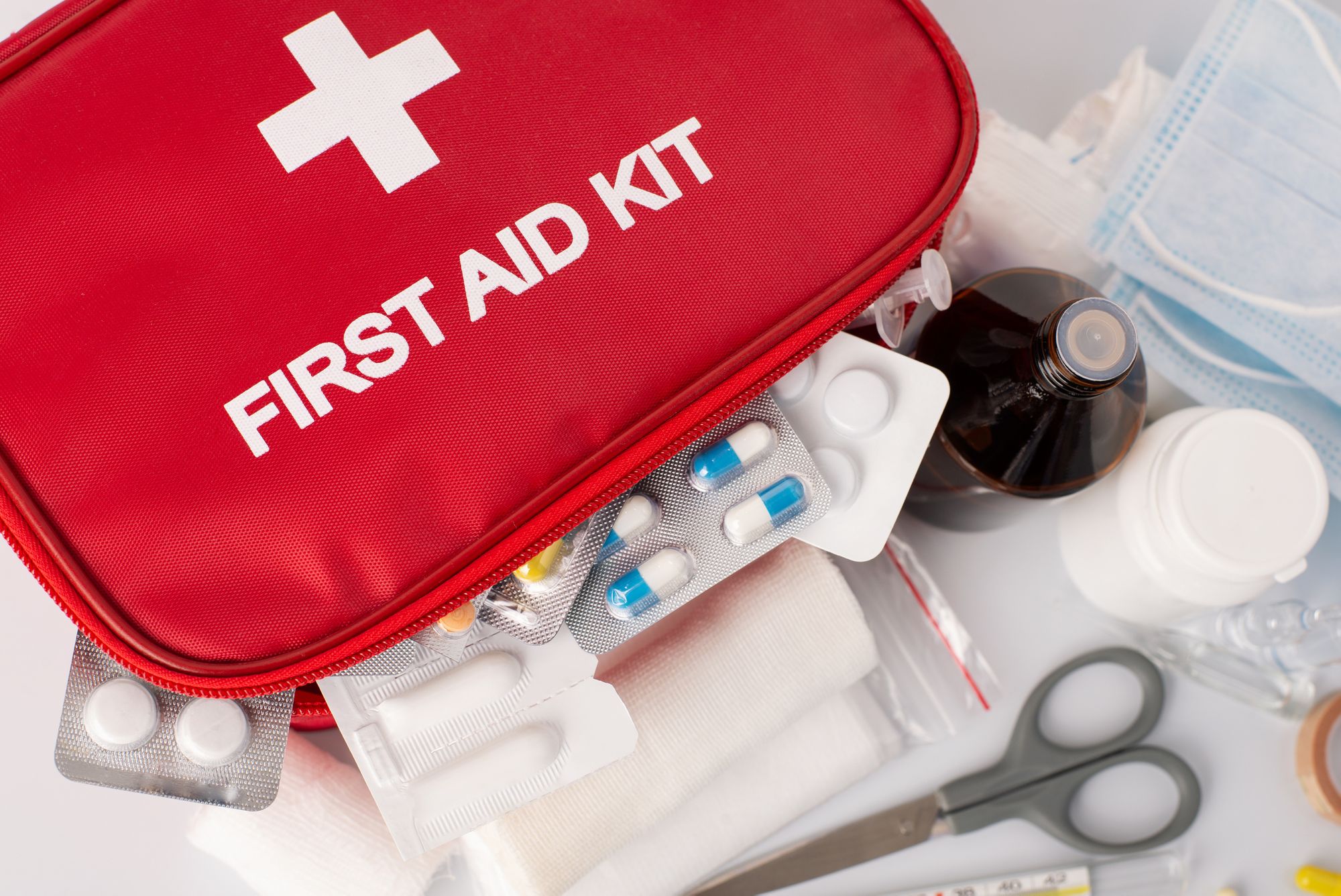 An open first aid kit.