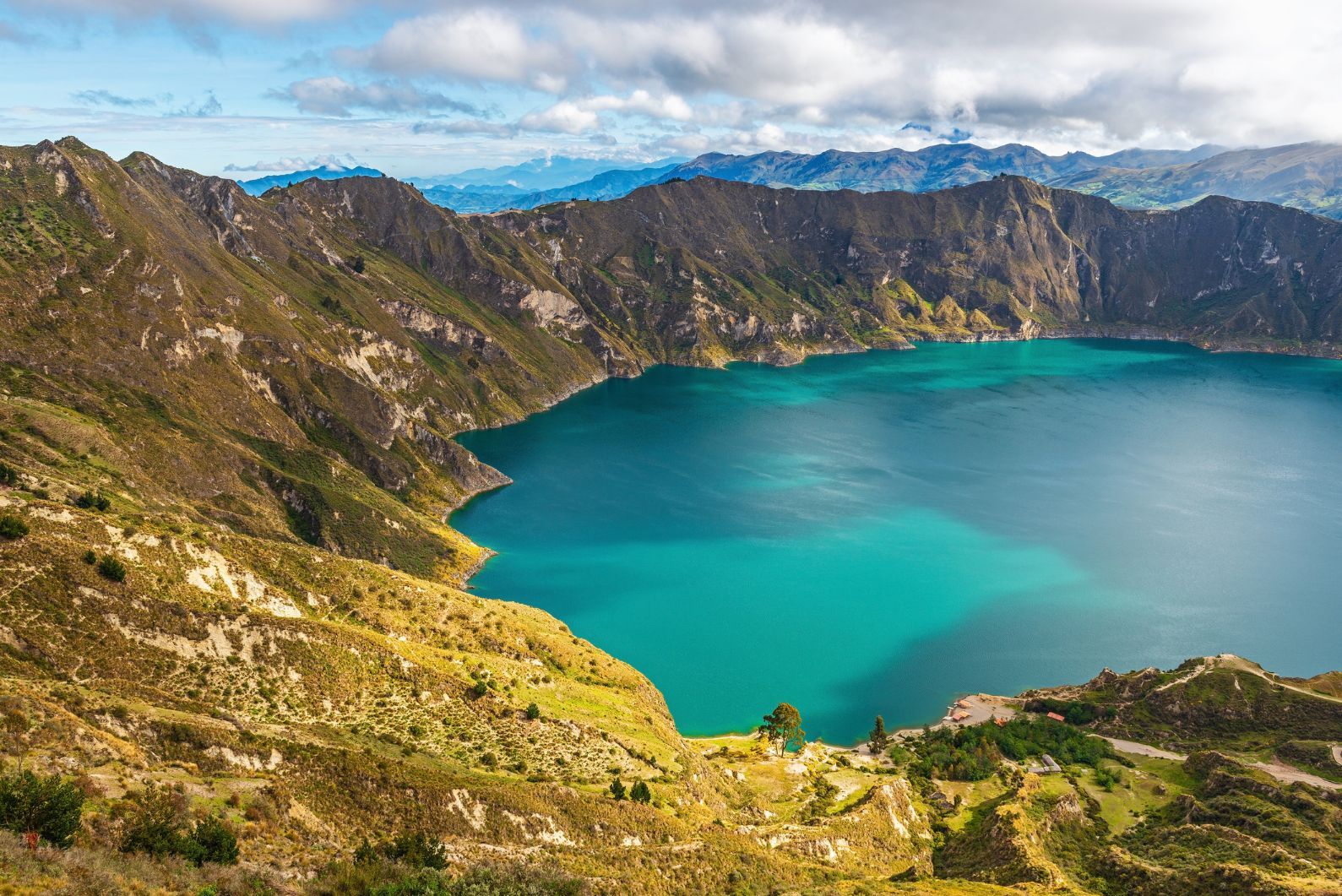 The volcanic turquoise crater lagoon of Quilotoa, Quito region, Ecuador.