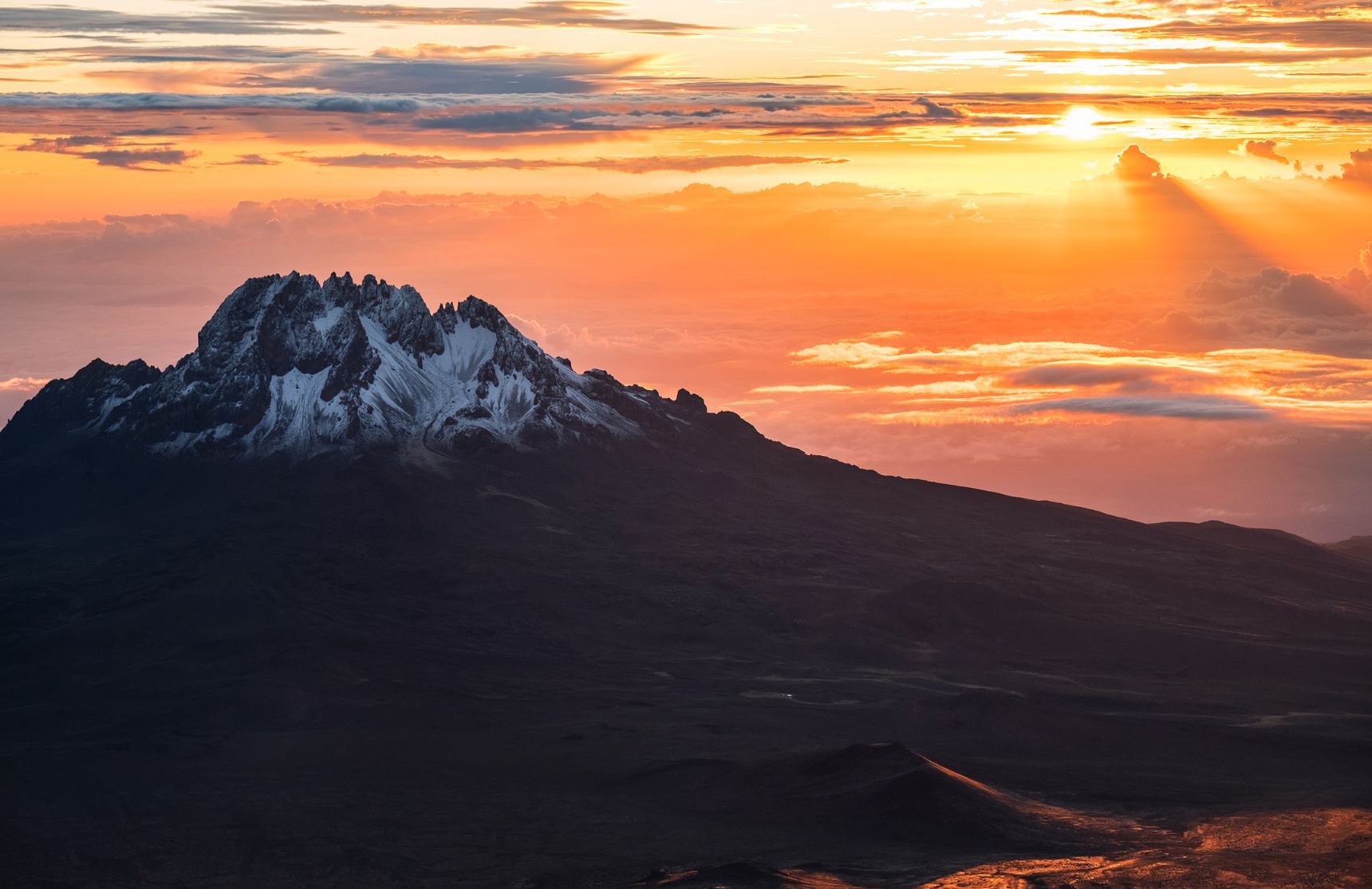 A breathtaking view of sunrise on Mawenzi, the second highest peak on Kilimanjaro, and fourth highest peak in Africa.
