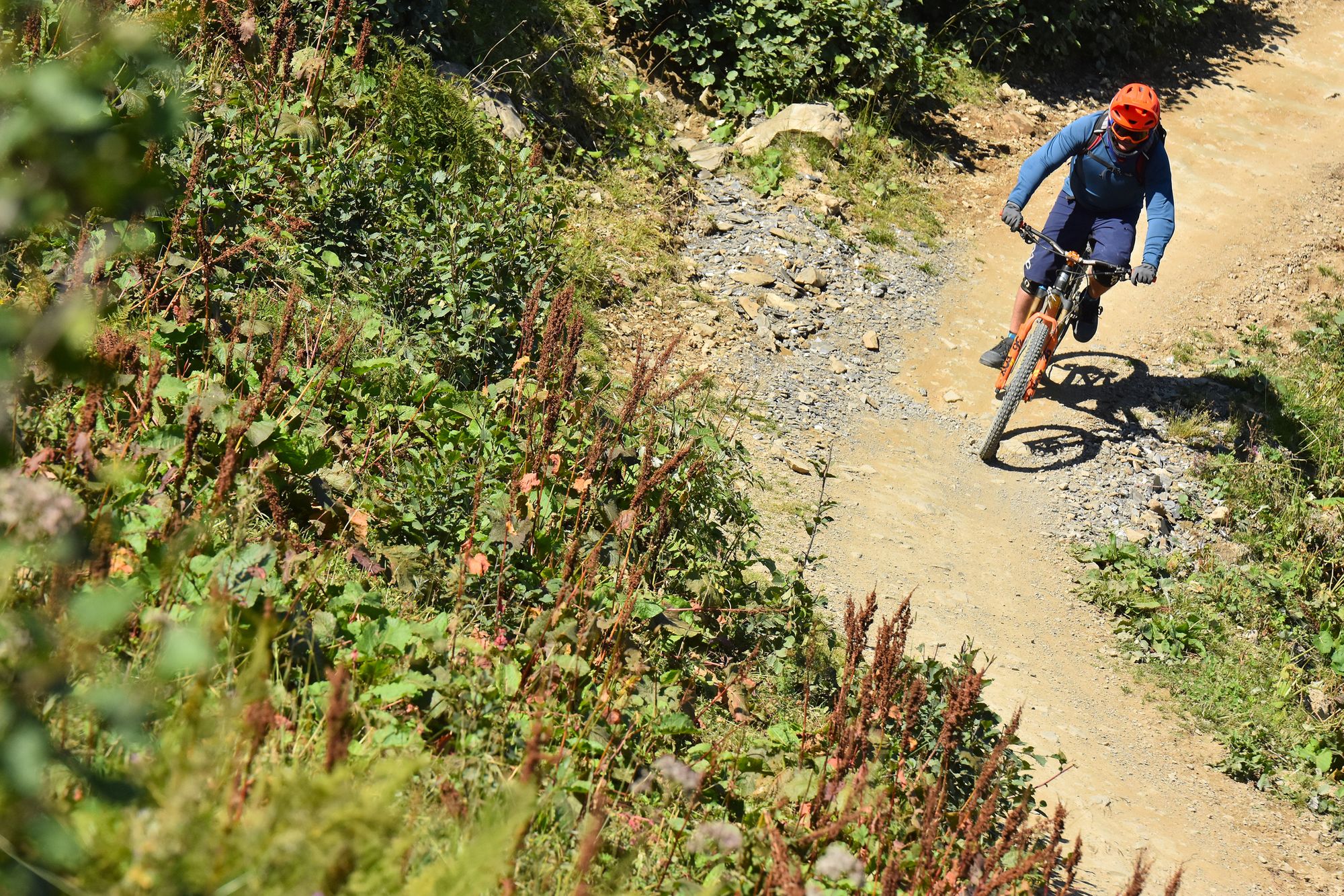 A cyclist on a mountain biking trail in Chatel in the Portes du Soleil, Haute Savoie region of the French Alps. 
