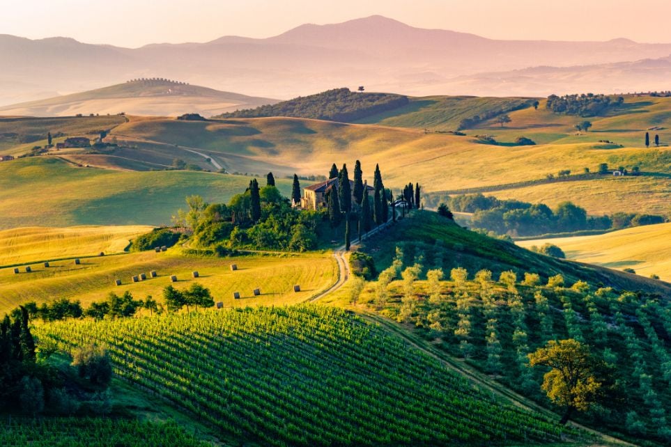 The rolling hills and farmland of Tuscany.