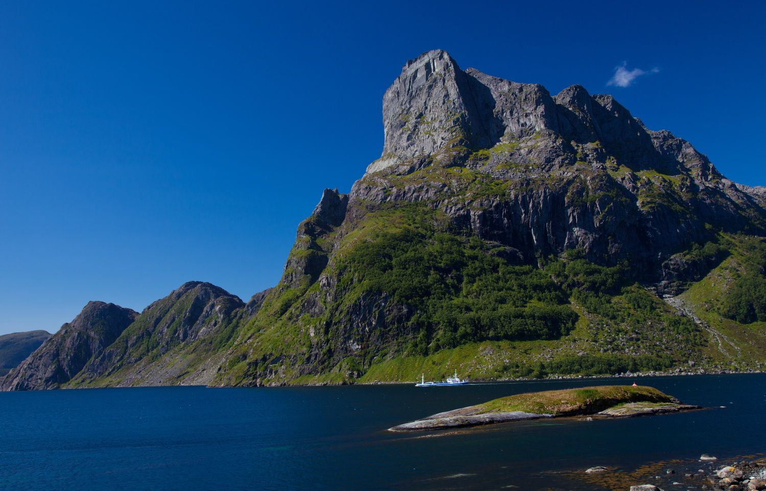 Mount Hornelen in Norway, sitting tall above the water.