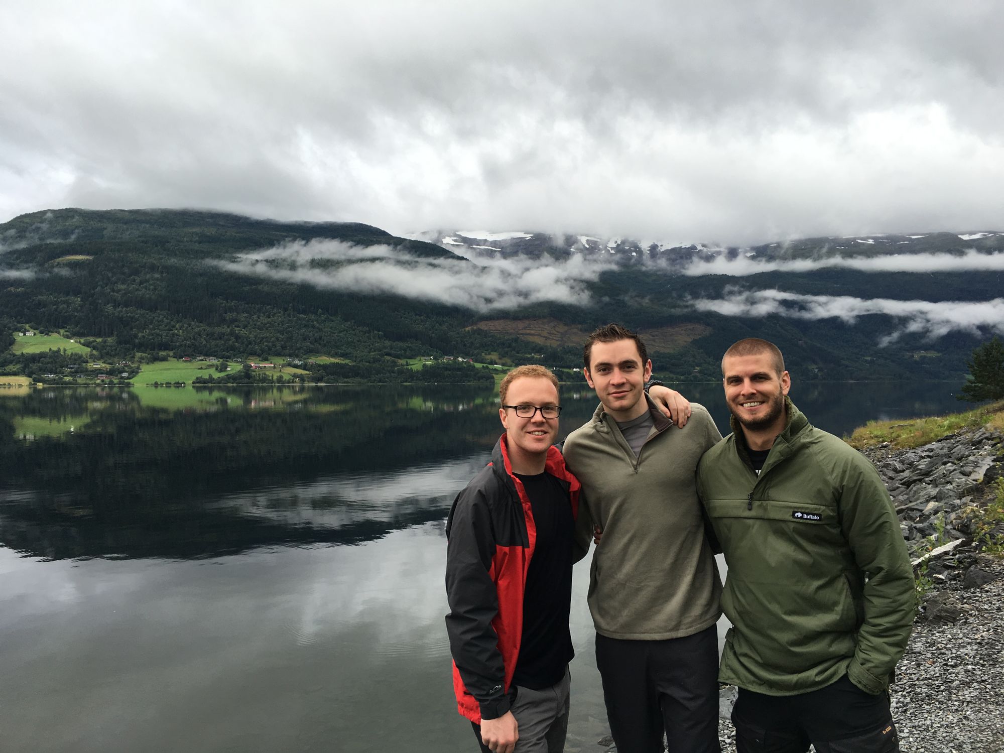 Jordan, James and Kris in front of the Norwegian fjords. 