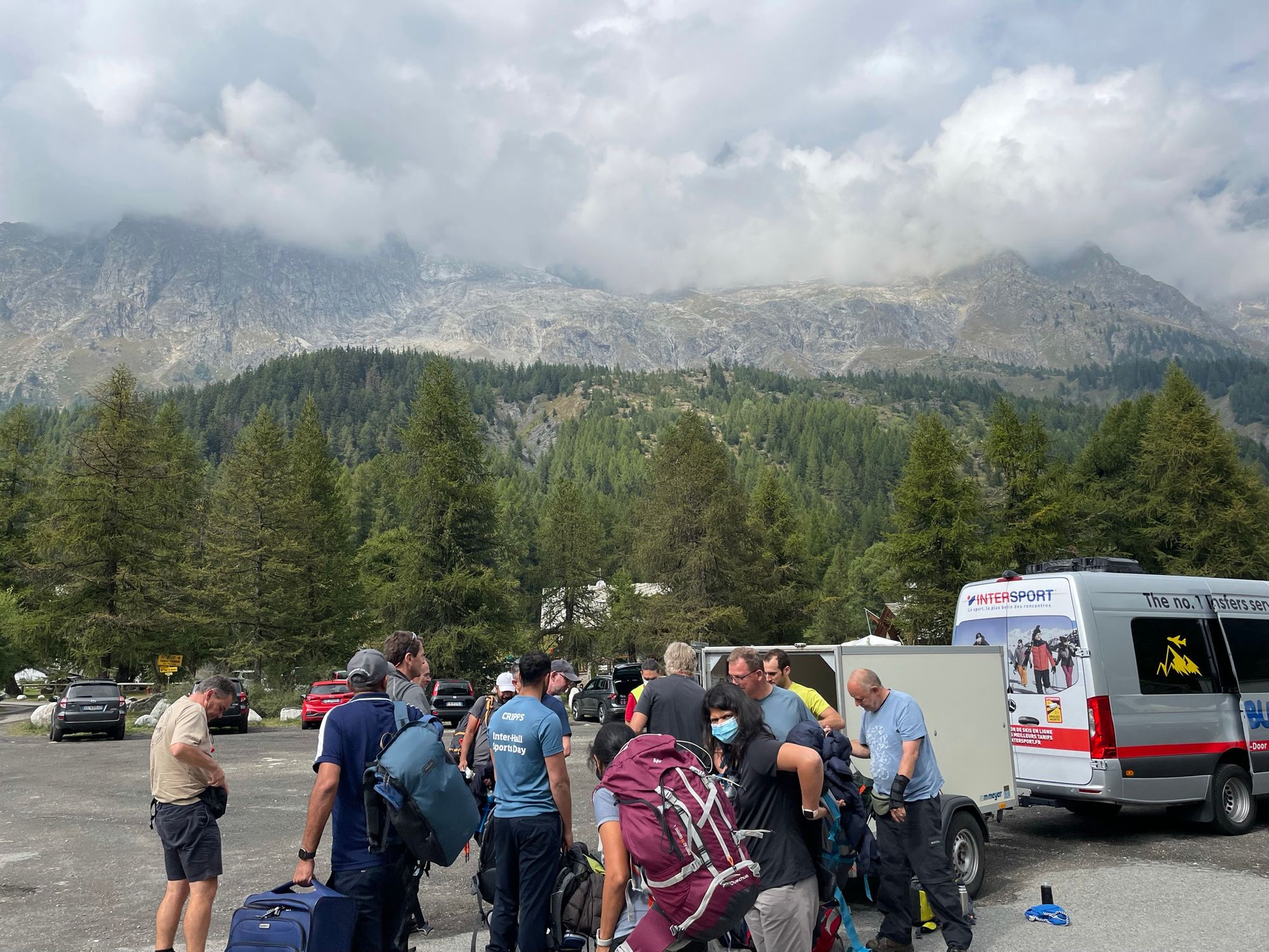 A hiking group arrives at the start point of the Mont Blanc Trek for a final kit check. Photo: Tim Wells