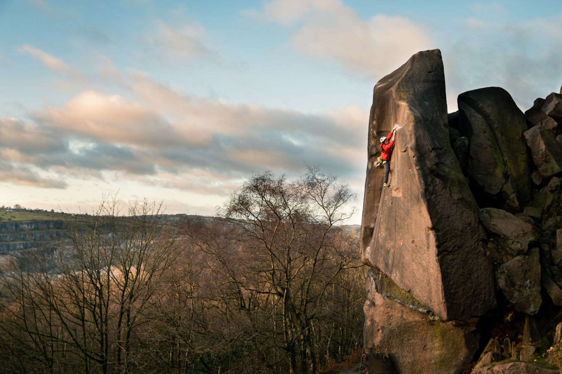 Caroline Ciavaldini taking on Gaia, a famous climbing route in Black Rocks, in the Peak District. 