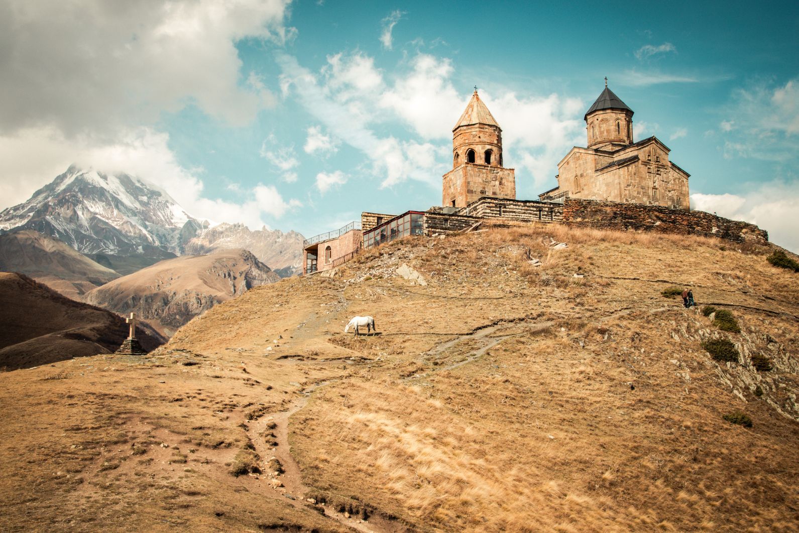 The Gergeti Trinity Church, beneath Mount Kazbek and near Kasbegi, in the Russian-Georgian border.