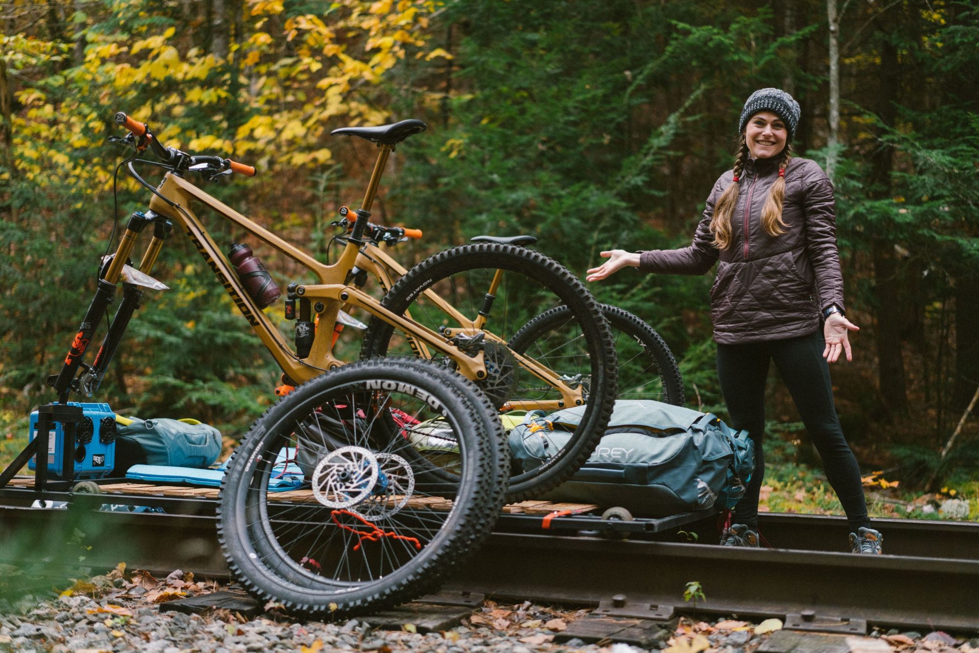 Evan Kay's rail bike on the tracks, his partner Ella next to him.