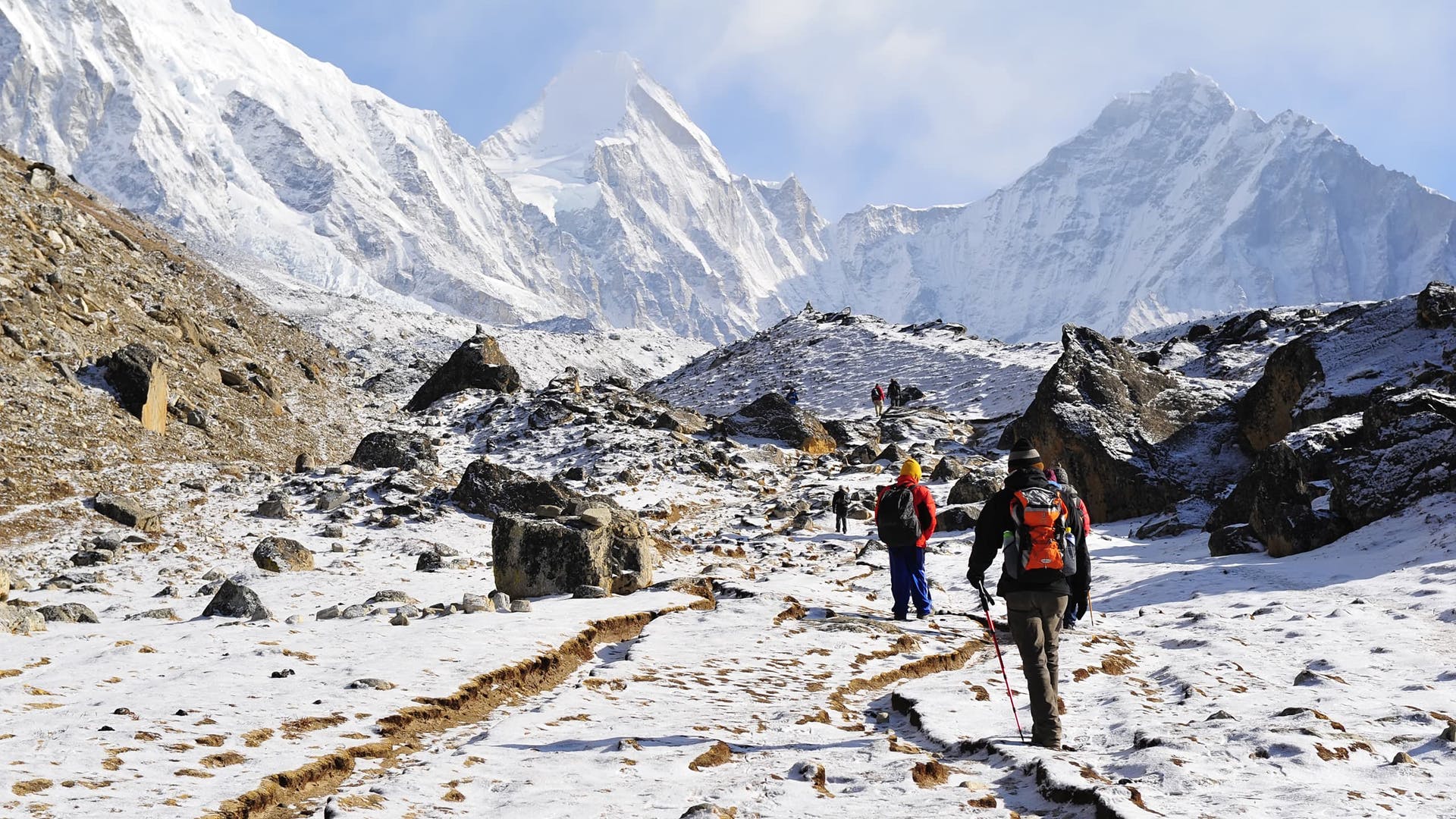 A group of hikers makes their way to Everest Base Camp, in the stunning Himalayas.