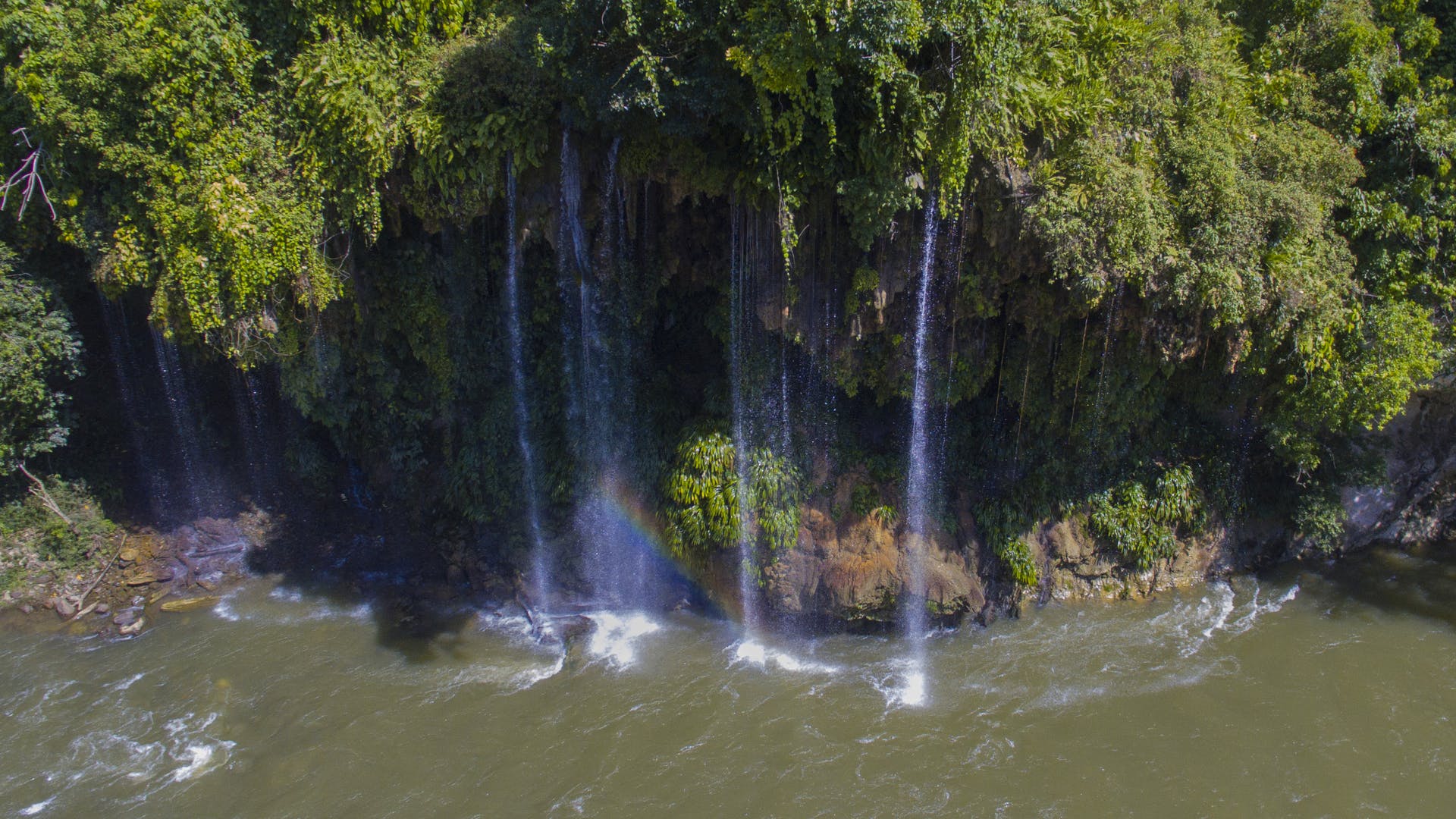 A plunging waterfall in the heart of the Columbian rainforest.