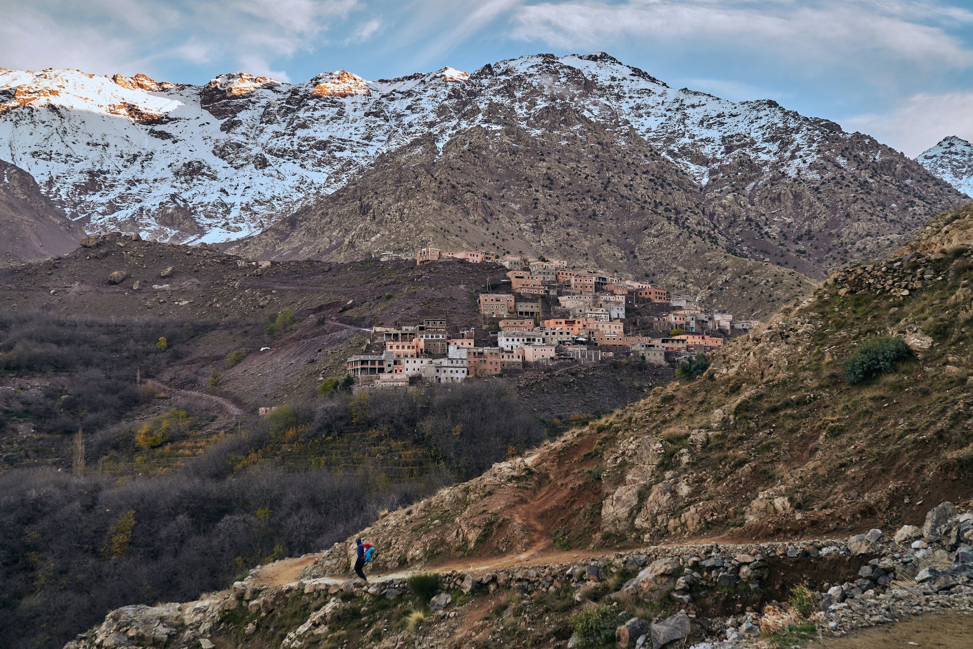 A hiker on the trail in the High Atlas Mountains, Morocco.