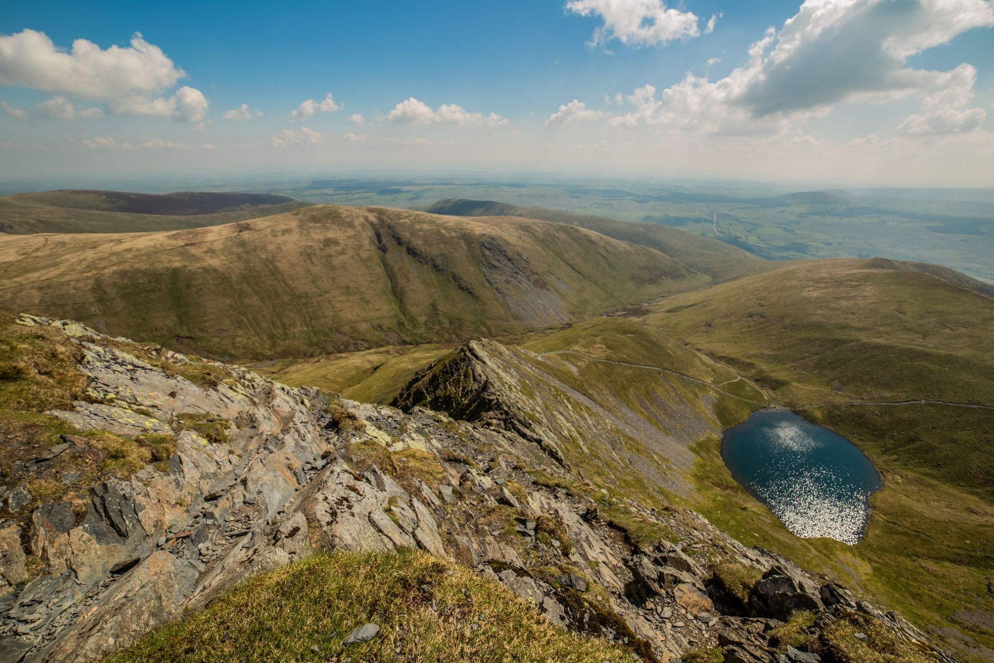 Looking out over the Lake District from Sharp Edge, Blencathra. Photo: Getty