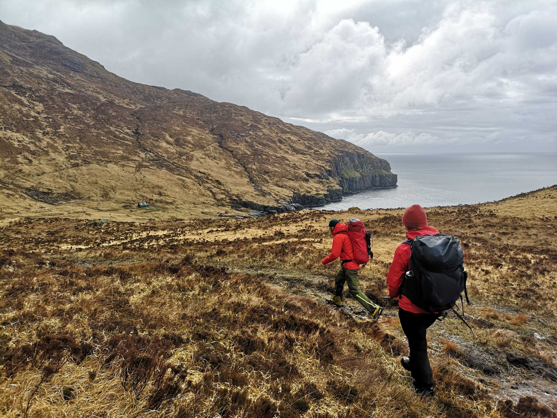 Two hikers on the Isle of Rum, on Scotland's Inner Hebrides.