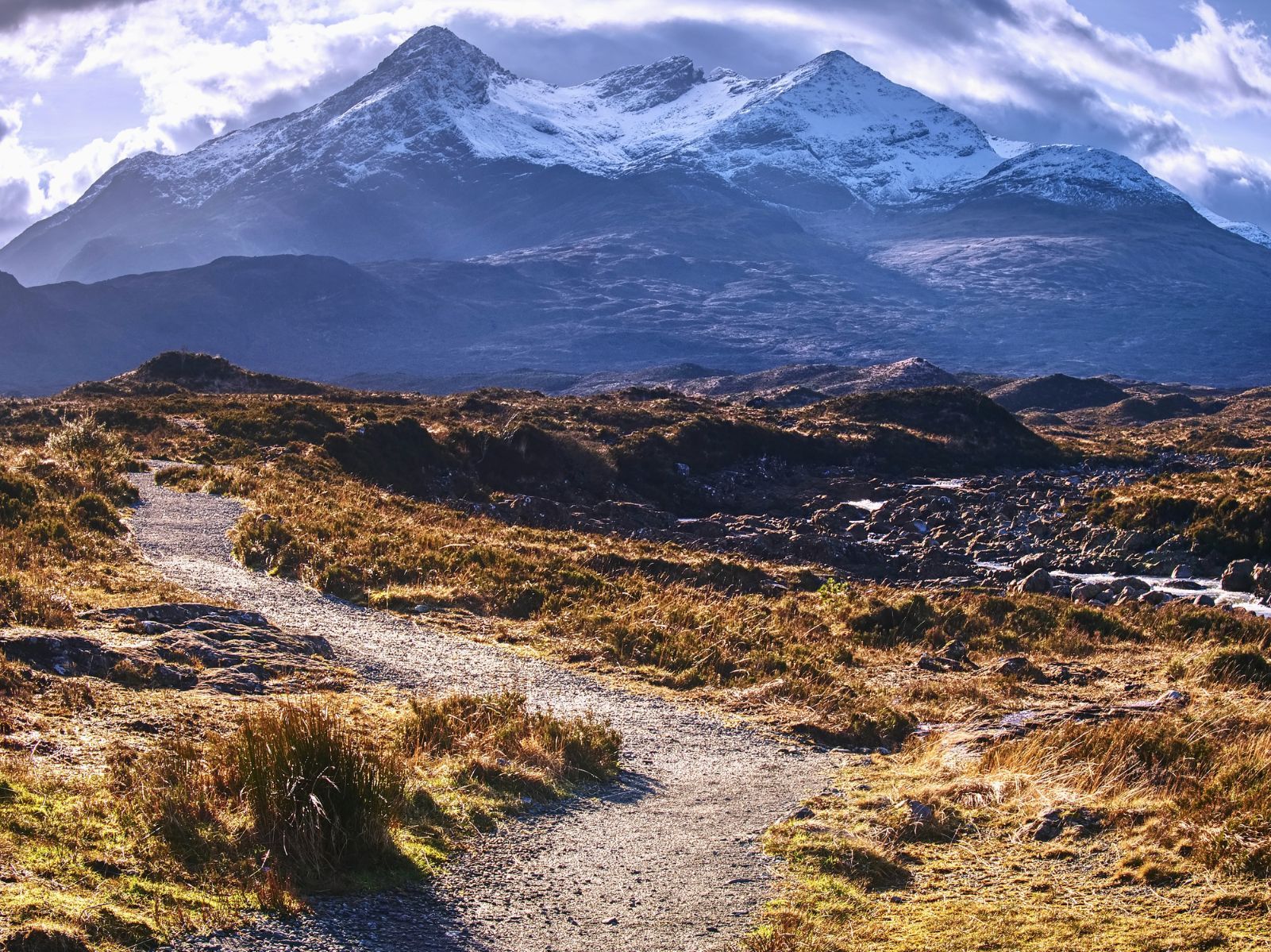 The River Sligachan and the clouds gathering above Sgurr nan Gillean, in the Cuillin Mountains, behind. Photo: Getty
