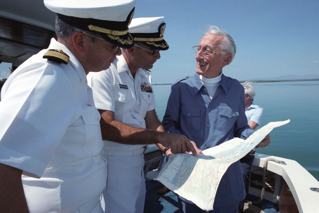The environmentalist Jacques Cousteau with officers on a visit to Guantanamo Bay in April 1986. Photo: The U.S. National Archives